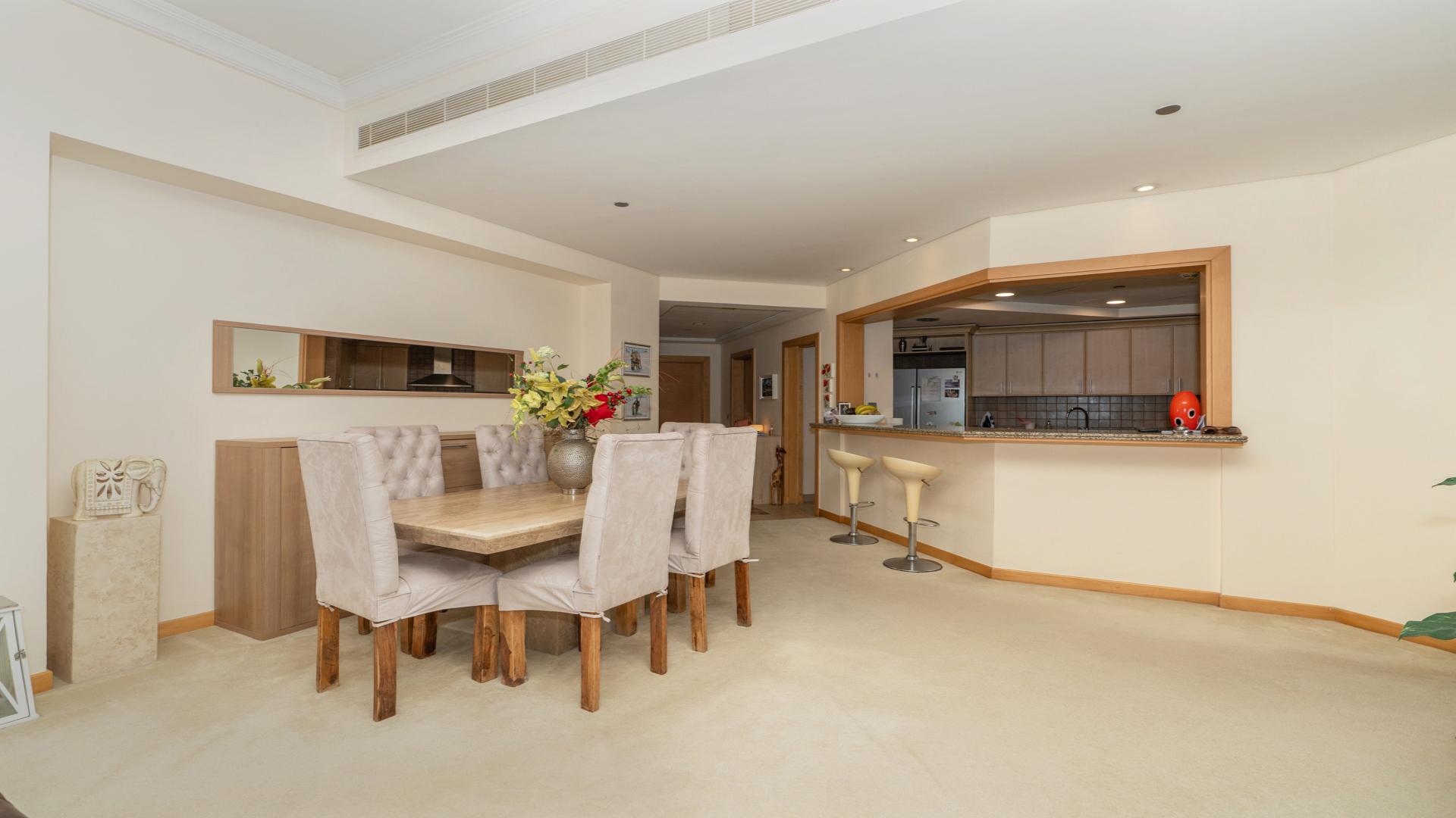 Spacious living room in Shoreline Apartments, Palm Jumeirah, featuring modern furniture and decor