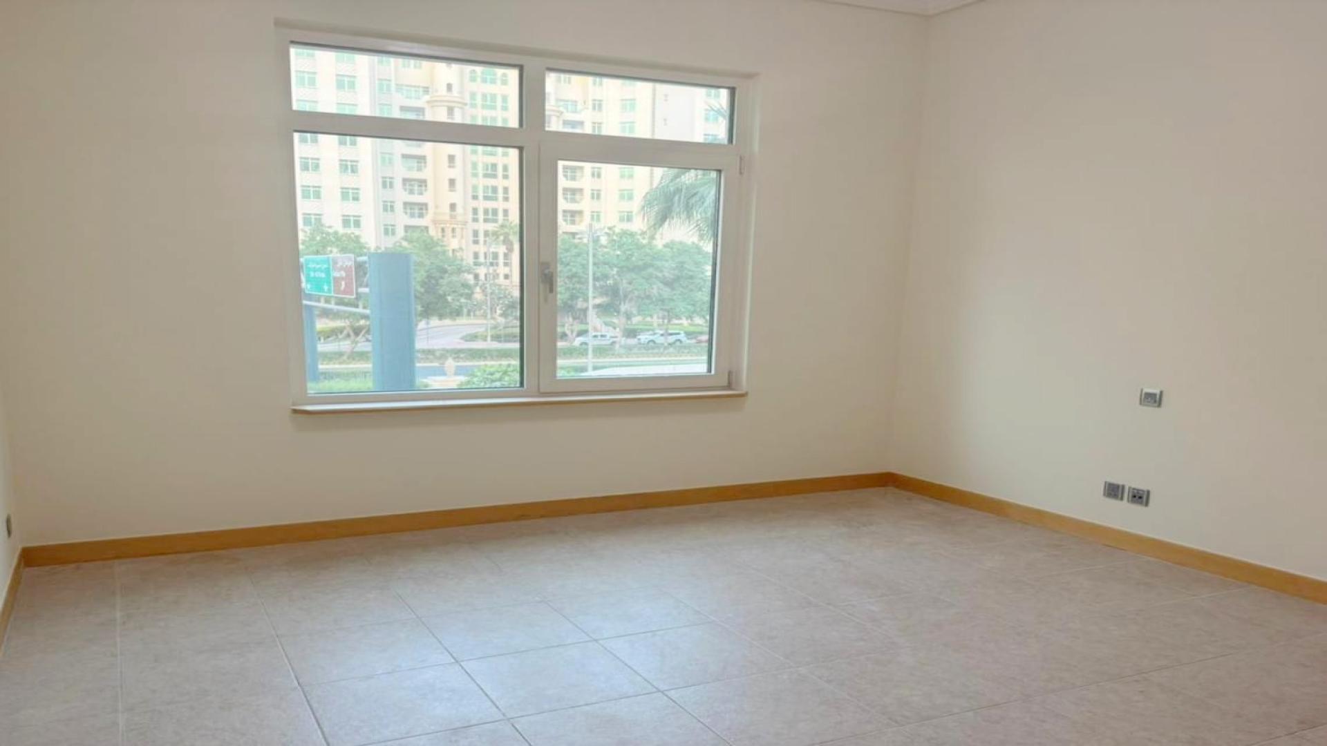 Spacious open-plan kitchen and living area in Shoreline Apartments, Palm Jumeirah rental property