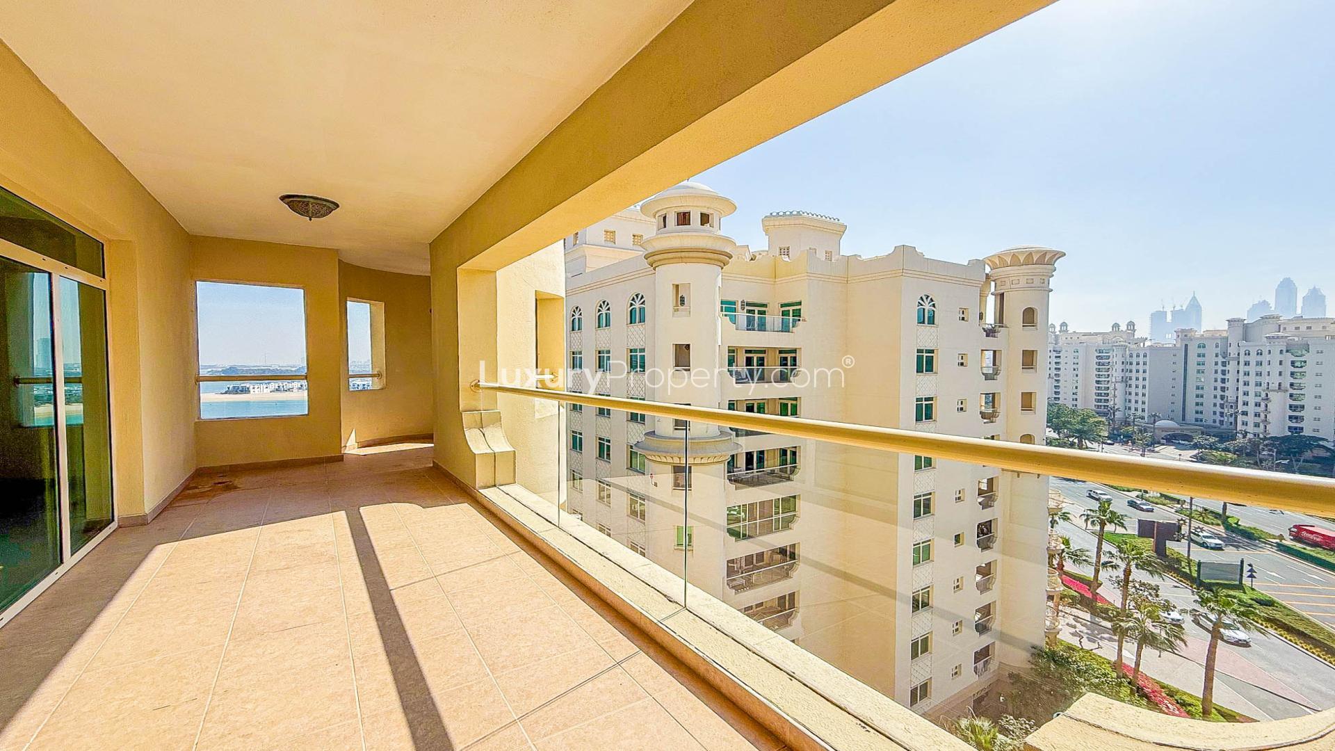 Unfurnished modern kitchen in Shoreline Apartments, Palm Jumeirah with appliances and granite countertops