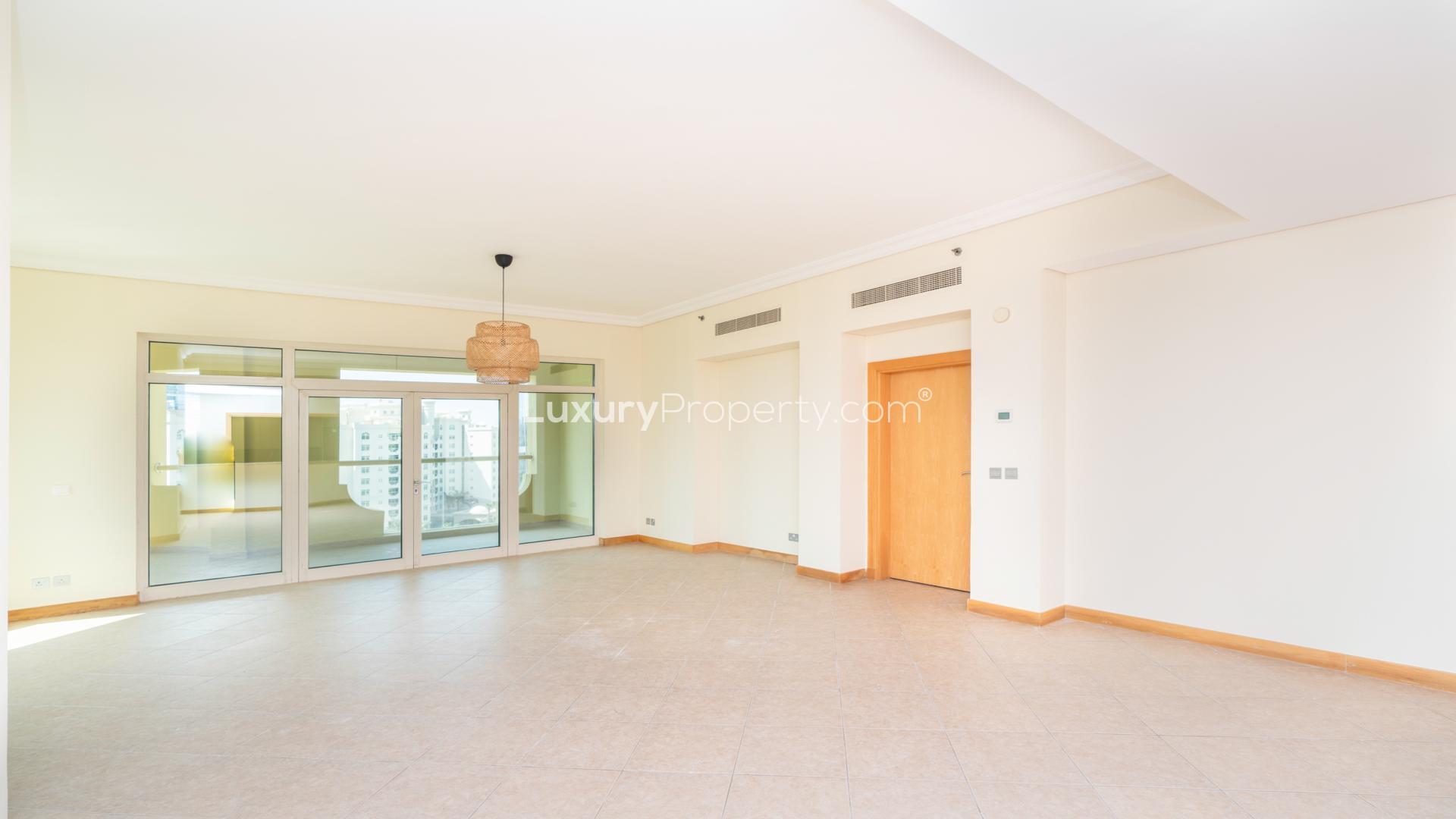 Spacious living room in 3-bedroom apartment, Al Sultana, Palm Jumeirah, with city views