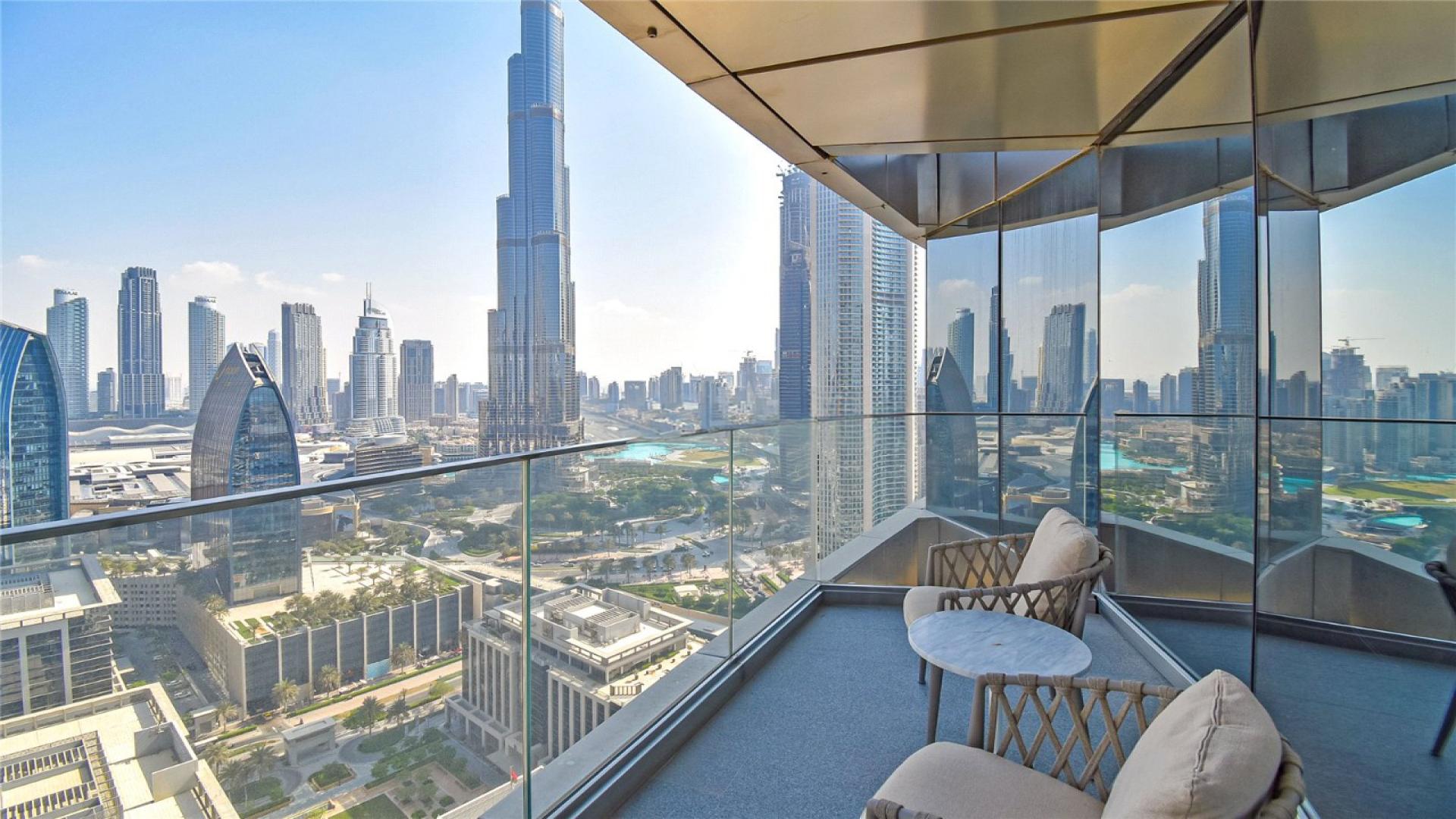 High-floor apartment living room in Sky View Towers, Downtown Dubai, with Burj Khalifa views