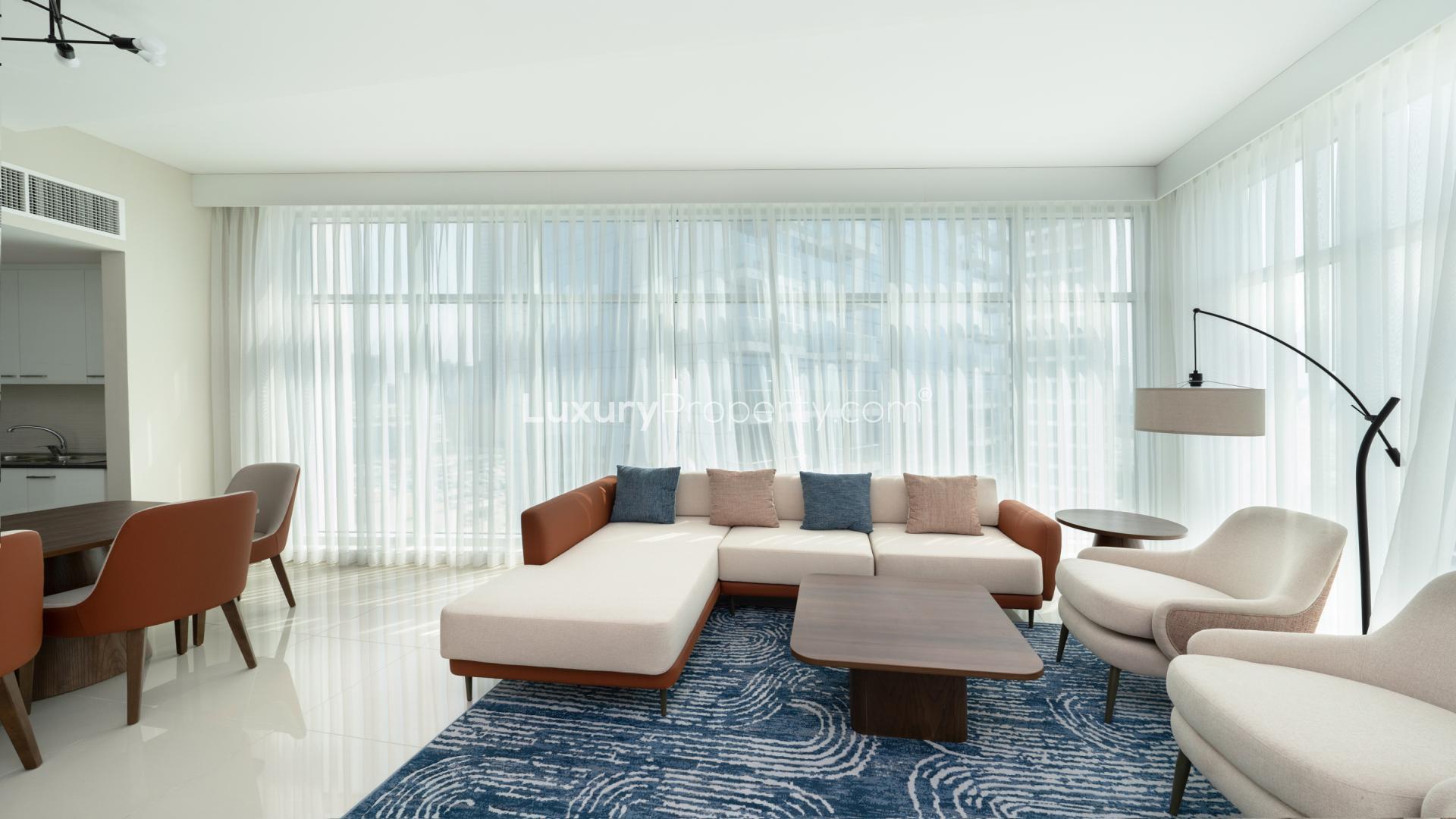 Fully furnished living room with modern decor in Al Sufouh 1 apartment for rent