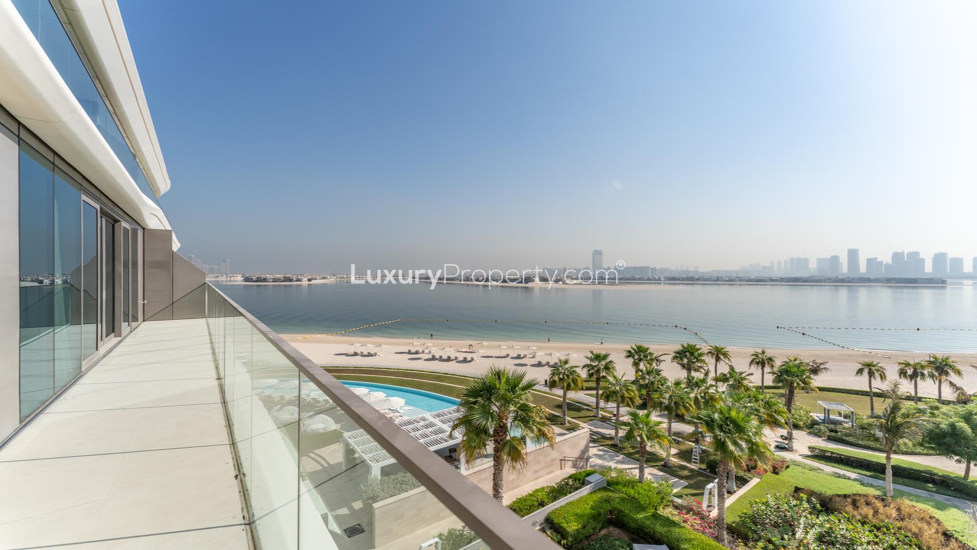 Spacious living room in Palm Jumeirah 3-bed apartment, featuring modern decor and natural light
