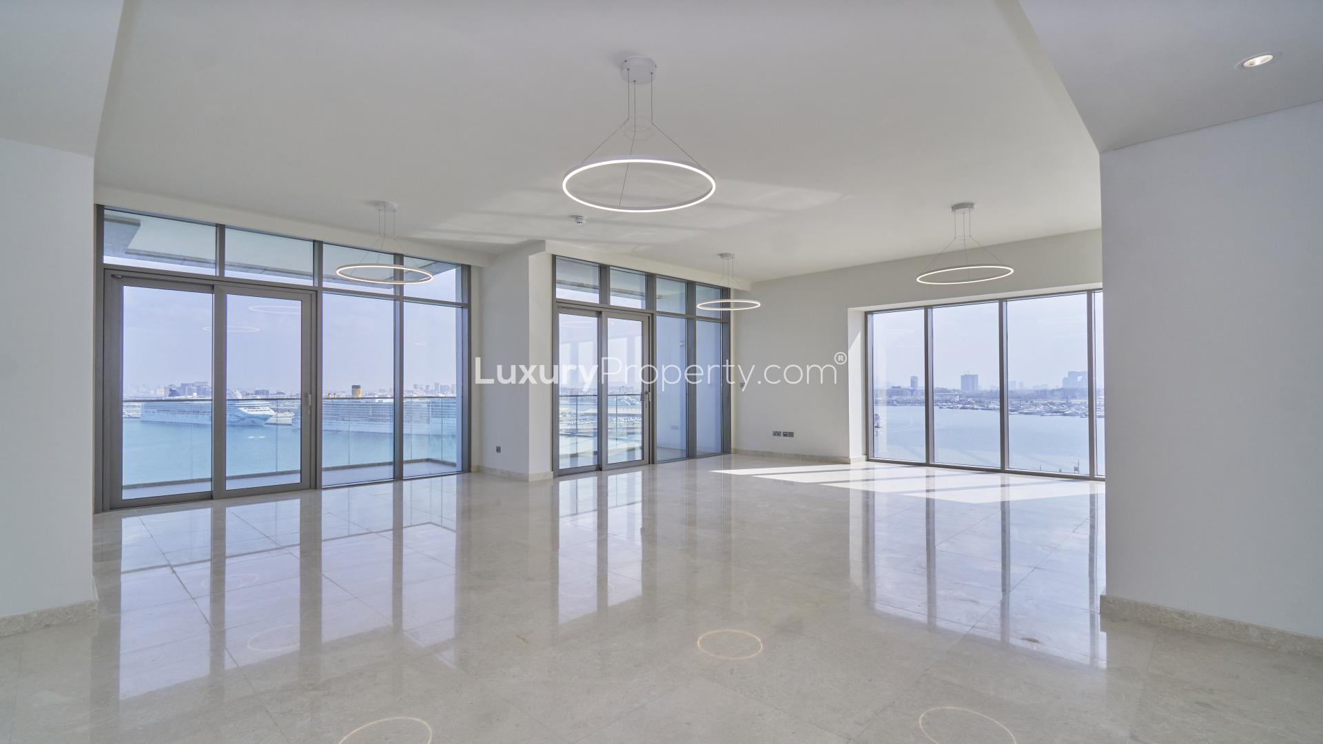 "Stunning sea view from balcony of 3-bedroom apartment in ANWA Tower, Maritime City.","Spacious living room with sea view in Anwa Tower apartment, Maritime City for rent.",Spacious living room with sea view in 3-bedroom Anwa Tower apartment for rent
