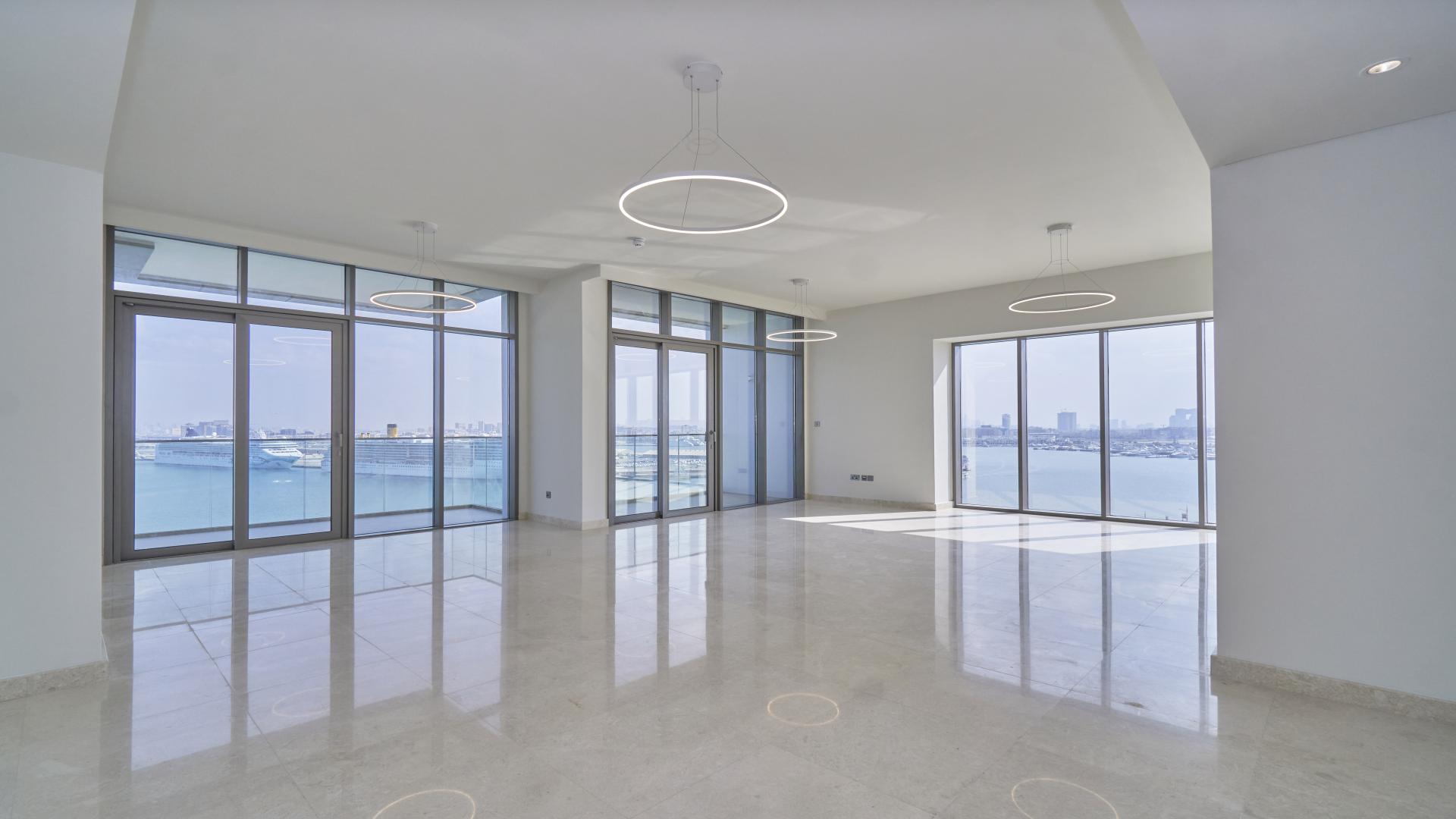 "Stunning sea view from balcony of 3-bedroom apartment in ANWA Tower, Maritime City.","Spacious living room with sea view in Anwa Tower apartment, Maritime City for rent.",Spacious living room with sea view in 3-bedroom Anwa Tower apartment for rent