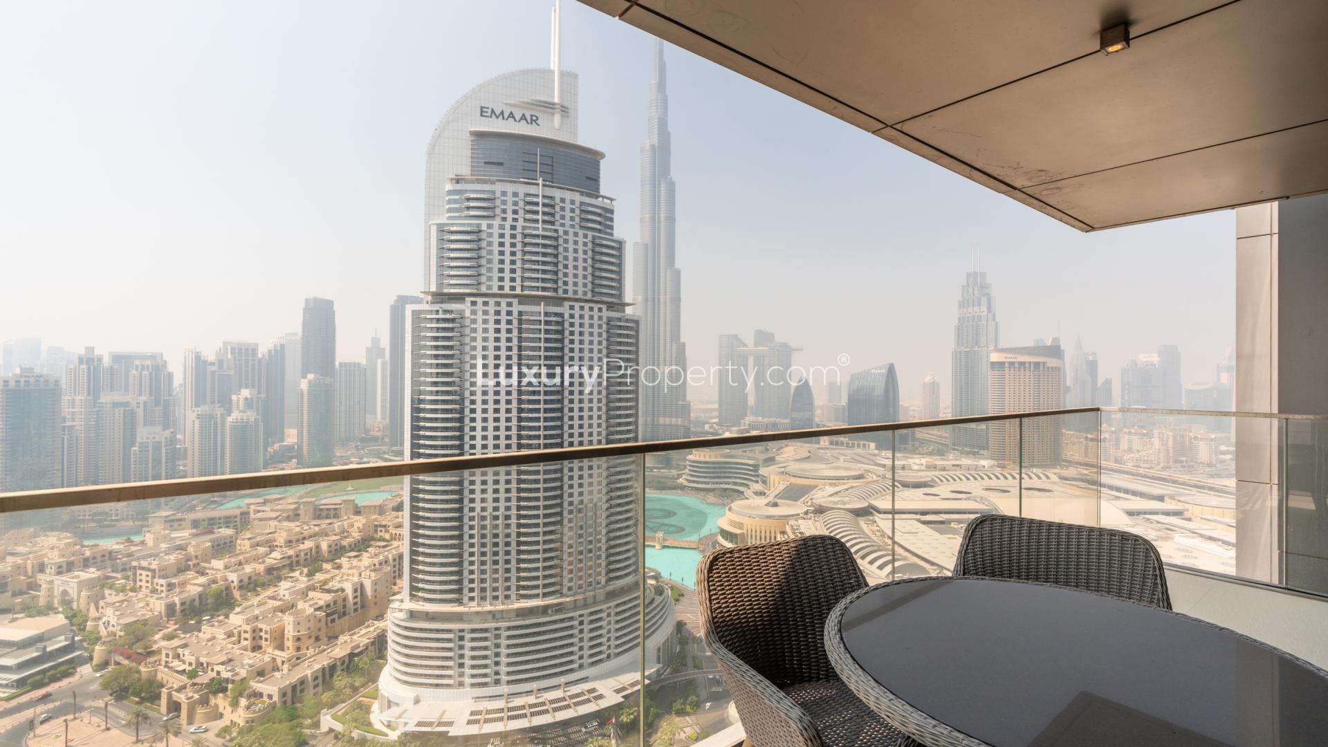 Modern living room in Boulevard Point apartment, Downtown Dubai, featuring elegant furnishings and city view