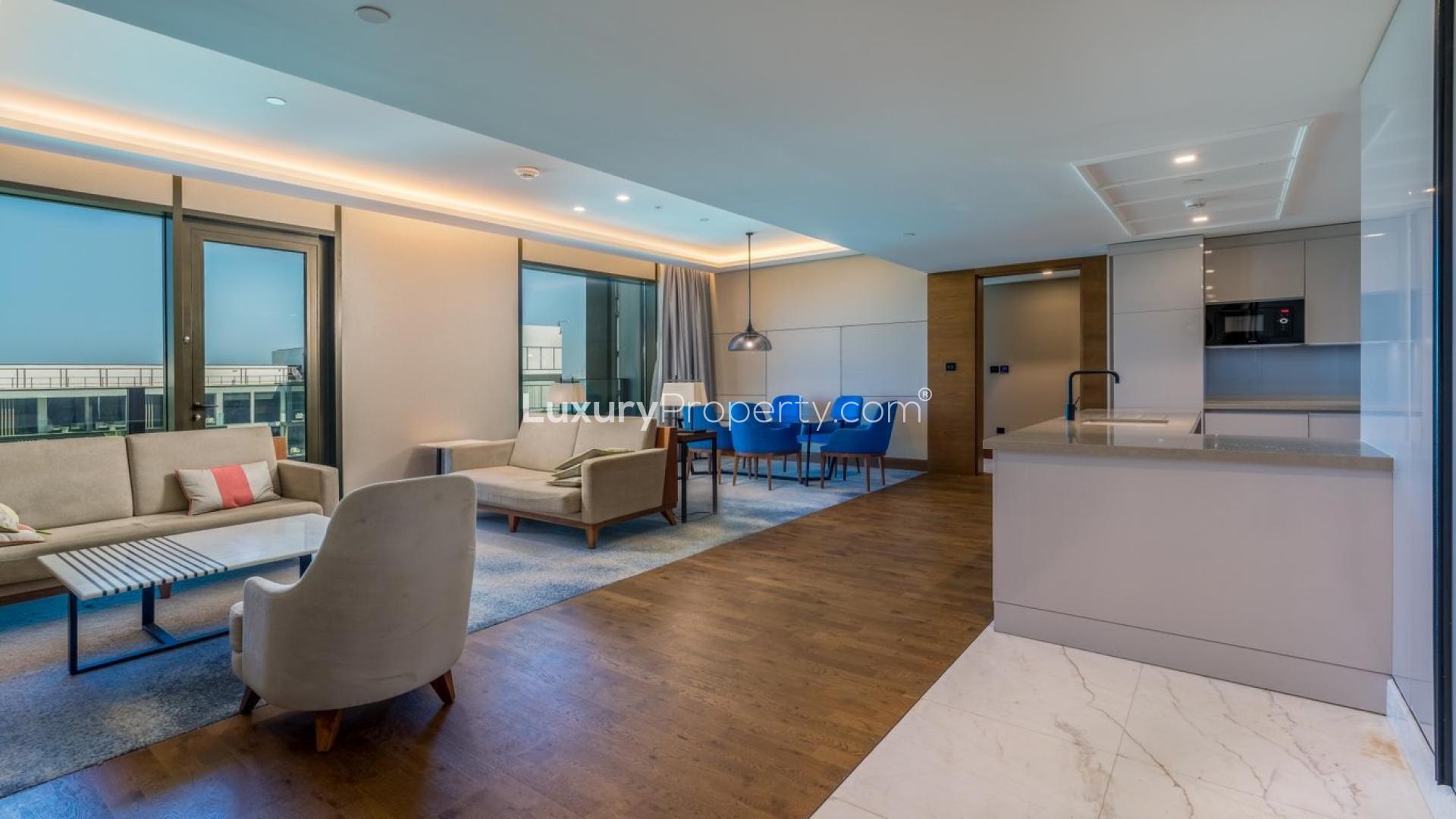 Modern open-plan kitchen and living area in 3-bedroom apartment, Caesars Bluewaters Dubai