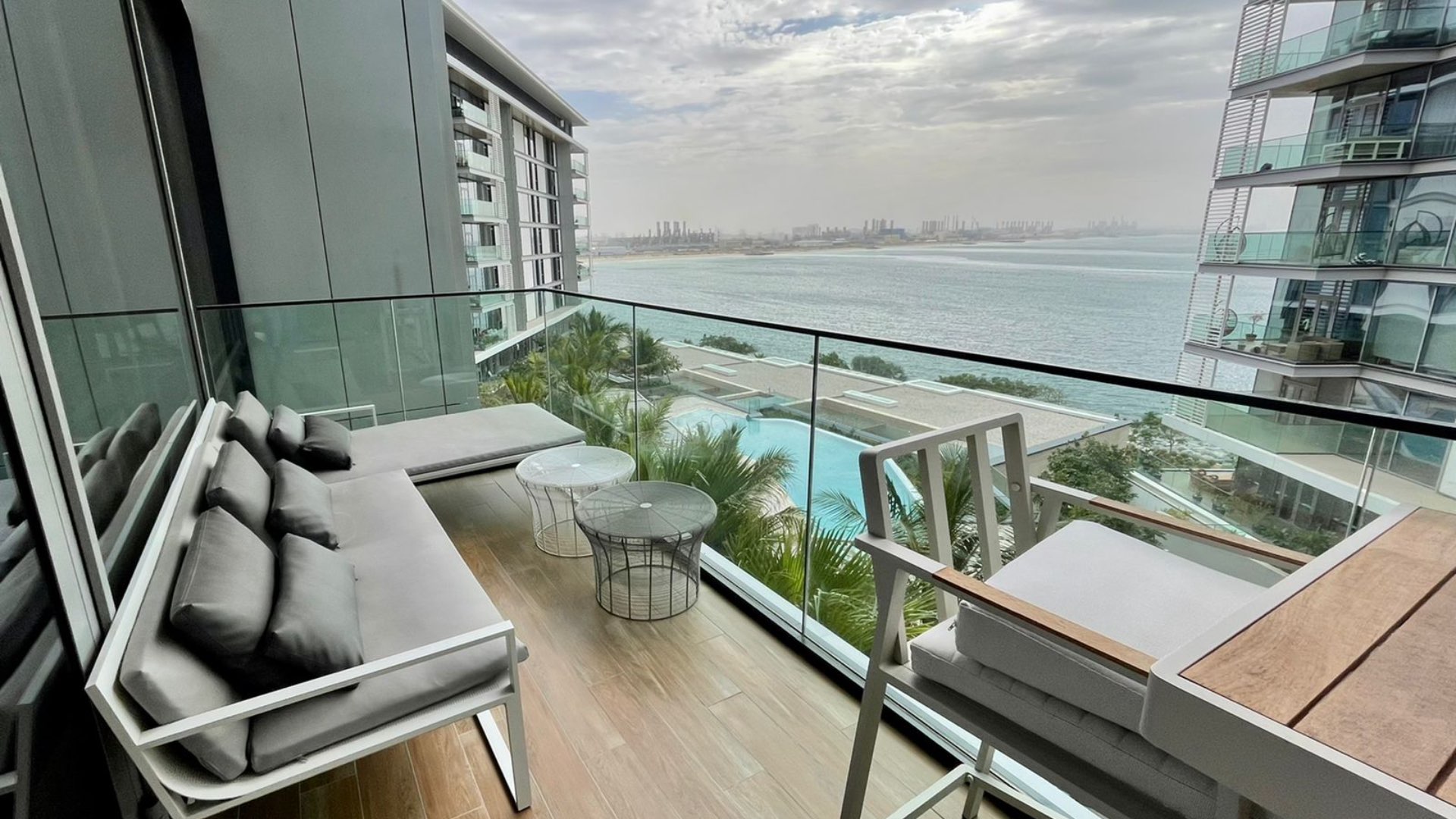 Elegant bedroom in Bluewaters Residence apartment, featuring cozy bed and modern decor