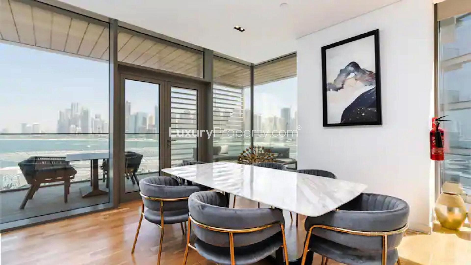 Modern kitchen and dining area in Bluewaters apartment for rent, high-end finishes, open layout