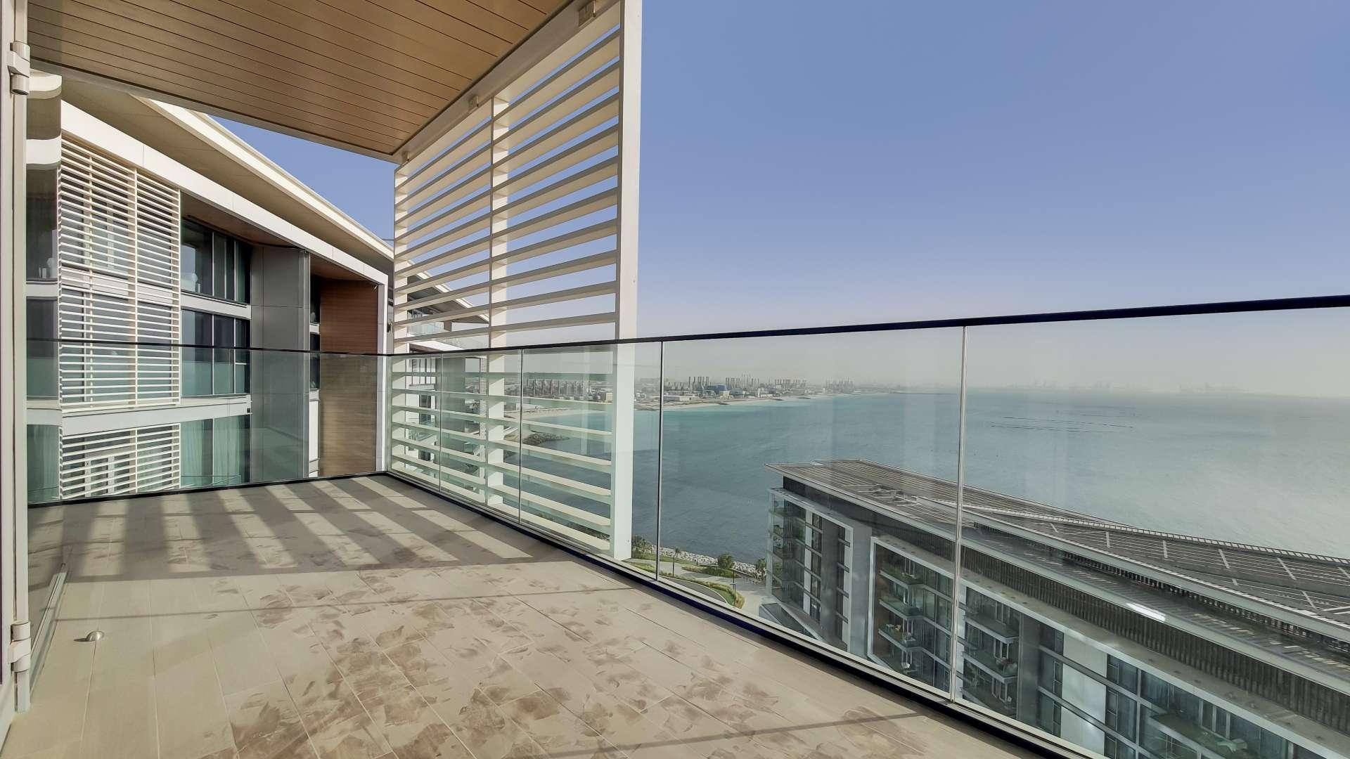 Modern kitchen in high floor Bluewaters apartment with sleek design and sea views