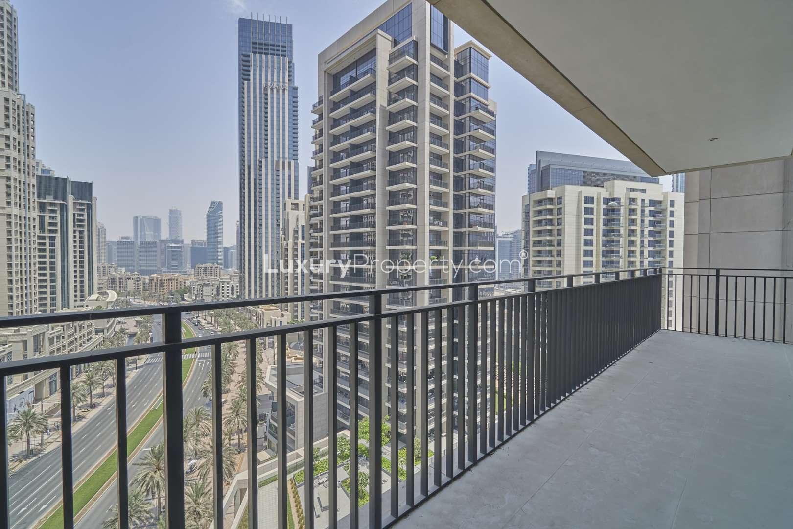 Aerial view of BLVD Crescent, Downtown Dubai, showcasing luxury apartment buildings for rent