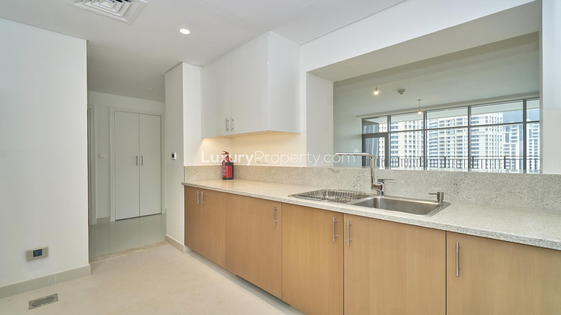 Spacious living room with city view in BLVD Crescent, Downtown Dubai apartment for rent