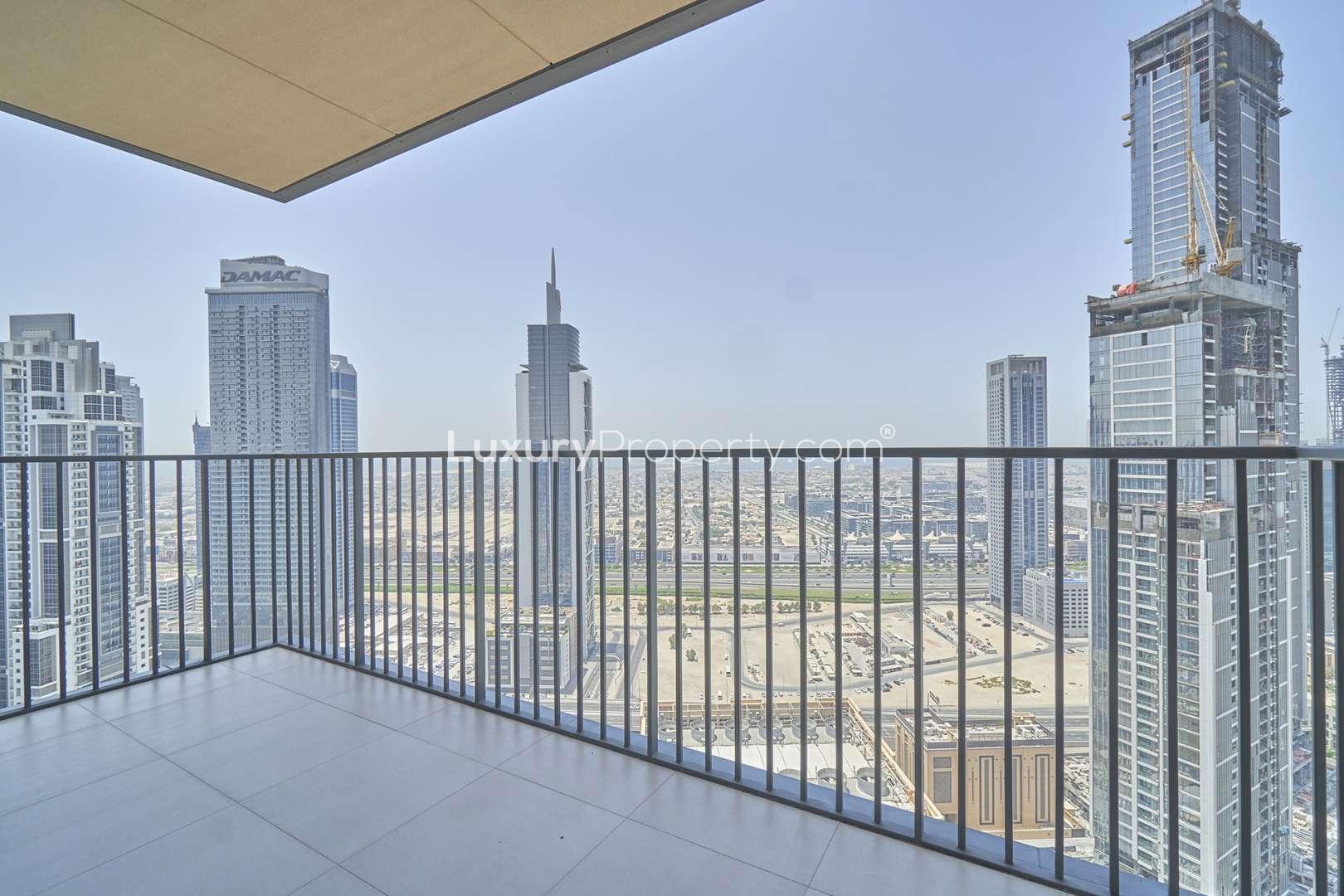 Spacious living room with floor-to-ceiling windows in BLVD Heights, Downtown Dubai apartment