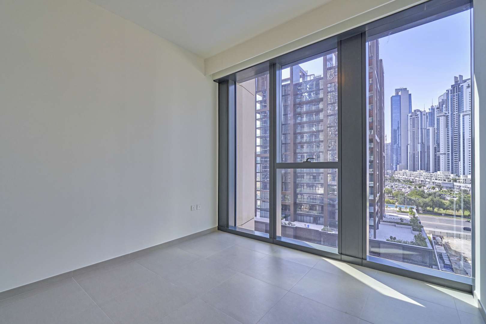 BLVD Heights apartment pool view, Downtown Dubai, three-bedroom rental property, luxury amenities