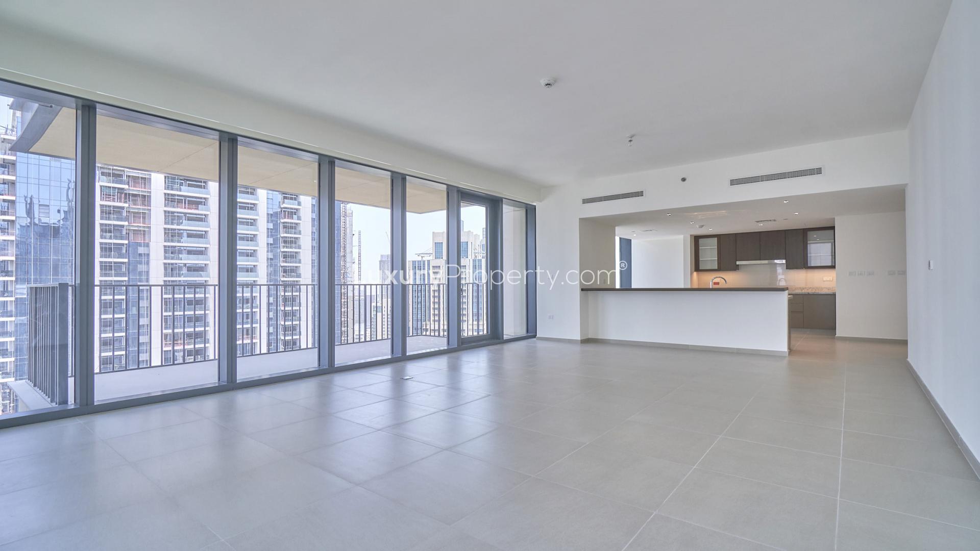 "Downtown Dubai apartment balcony view, high-rise buildings, available for rent, BLVD Heights.",Spacious apartment interior with floor-to-ceiling windows and downtown views, BLVD Heights, Downtown Dubai