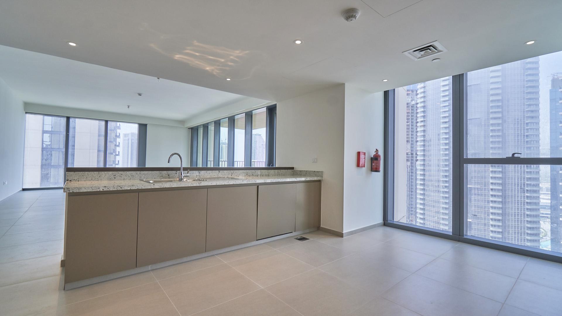 Modern kitchen with downtown views in spacious three-bedroom apartment, BLVD Heights, Downtown Dubai