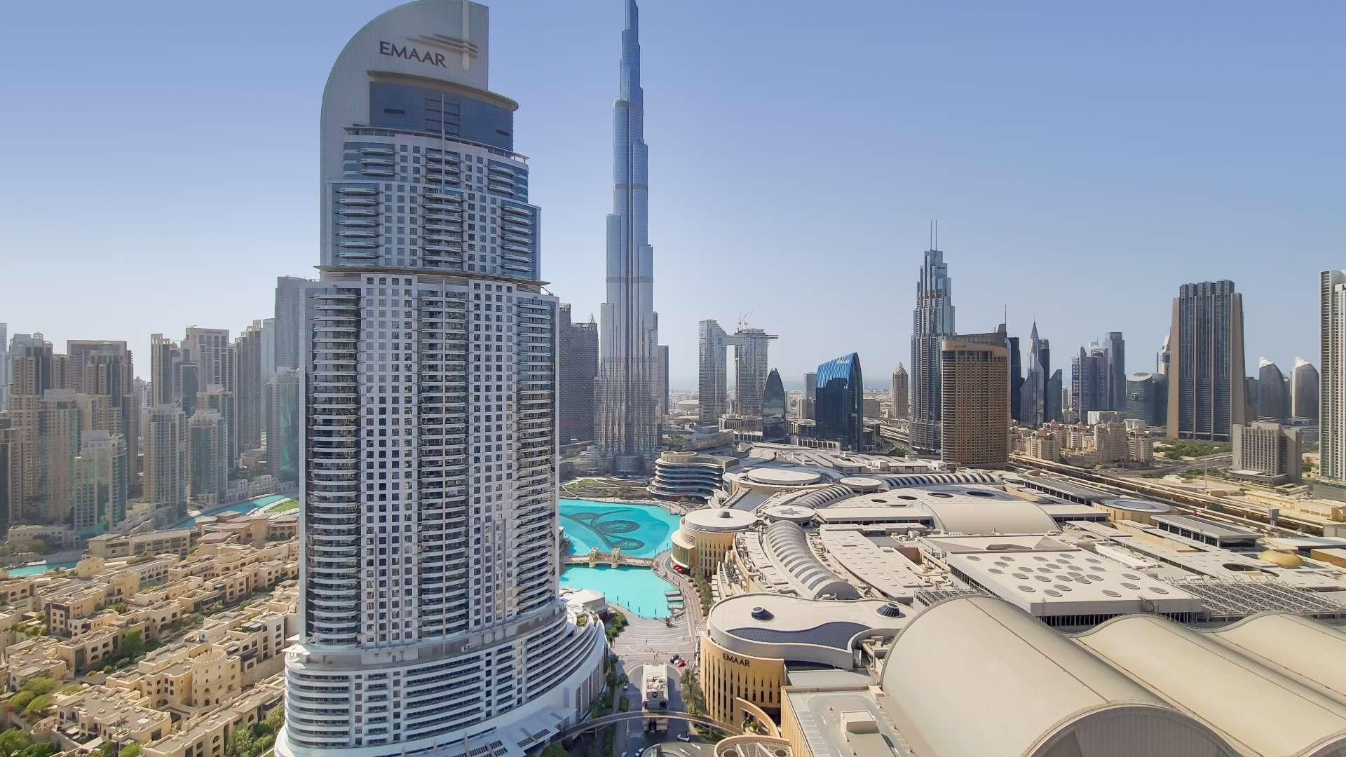 Luxurious living room in Downtown Dubai apartment, featuring elegant decor and modern furnishings