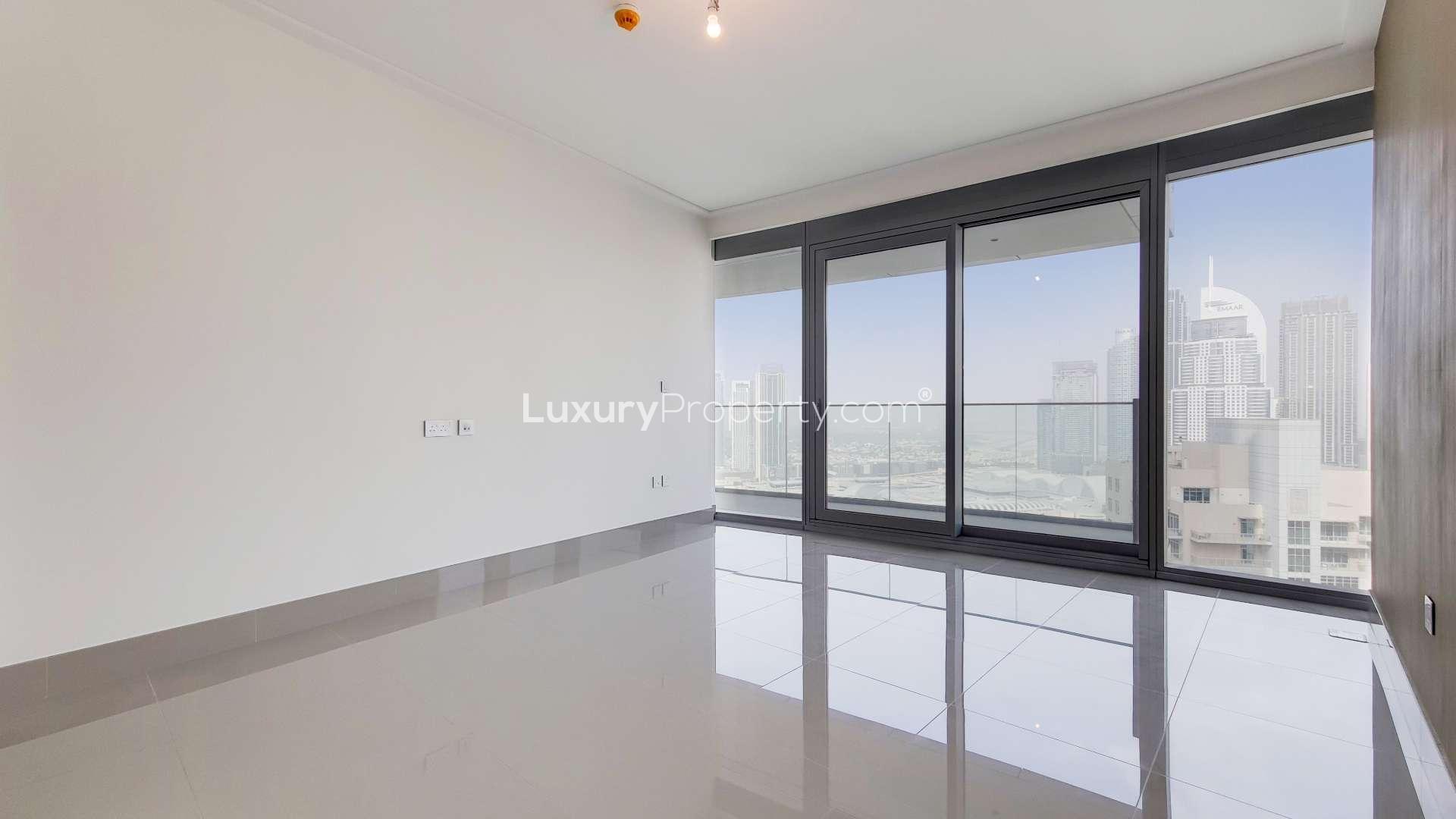 Empty modern apartment with Burj Khalifa view, spacious living area, Downtown Dubai rental