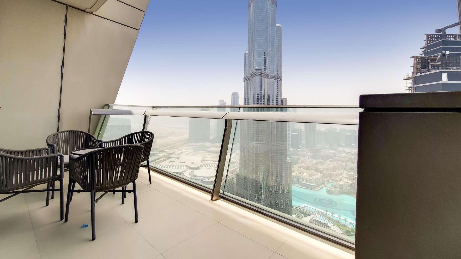 Fully furnished living room with Burj Khalifa view in Downtown Dubai apartment for rent