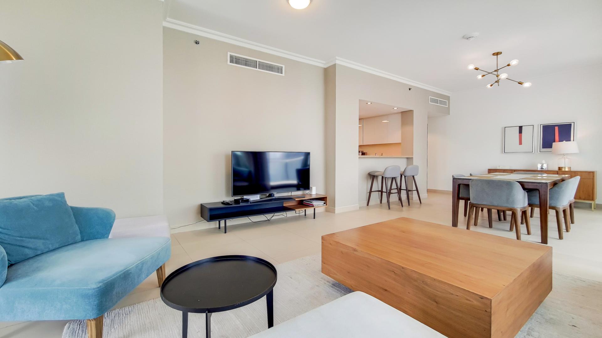 Fully furnished living room in Downtown Dubai apartment with Burj Khalifa view