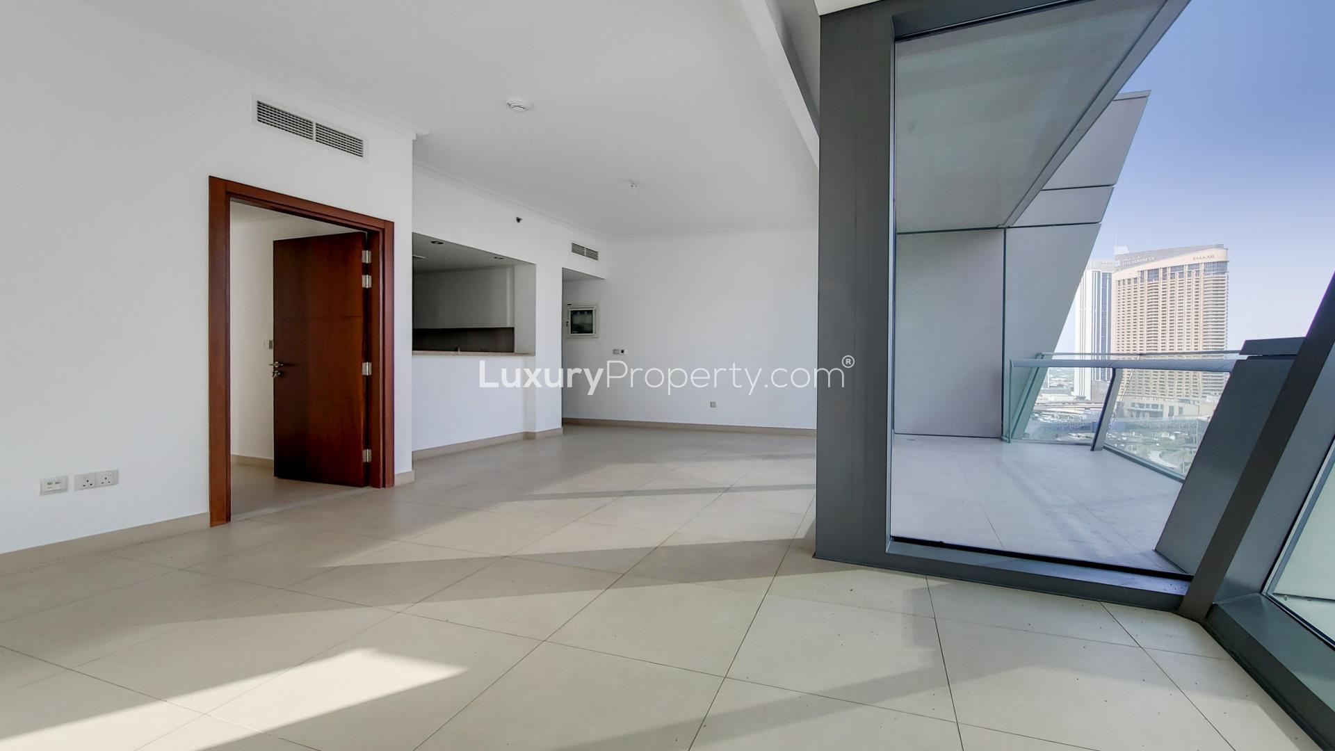 "Spacious Burj Vista apartment with panoramic Burj Khalifa view and modern interior in Downtown Dubai.",Empty modern apartment interior with balcony view in Burj Vista, Downtown Dubai