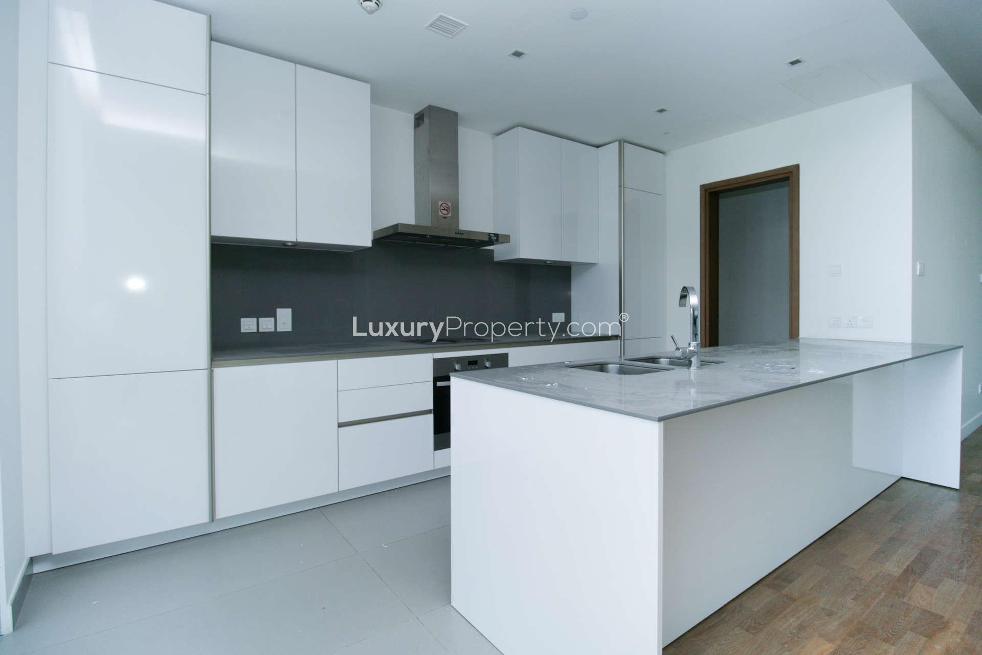 Open-plan kitchen and living area in City Walk apartment, Dubai, with modern finishes