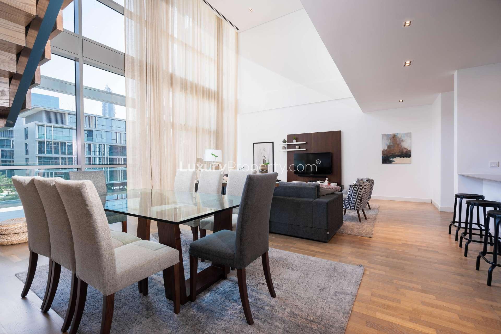 Modern living room in spacious City Walk apartment, Dubai, featuring stylish decor and natural light