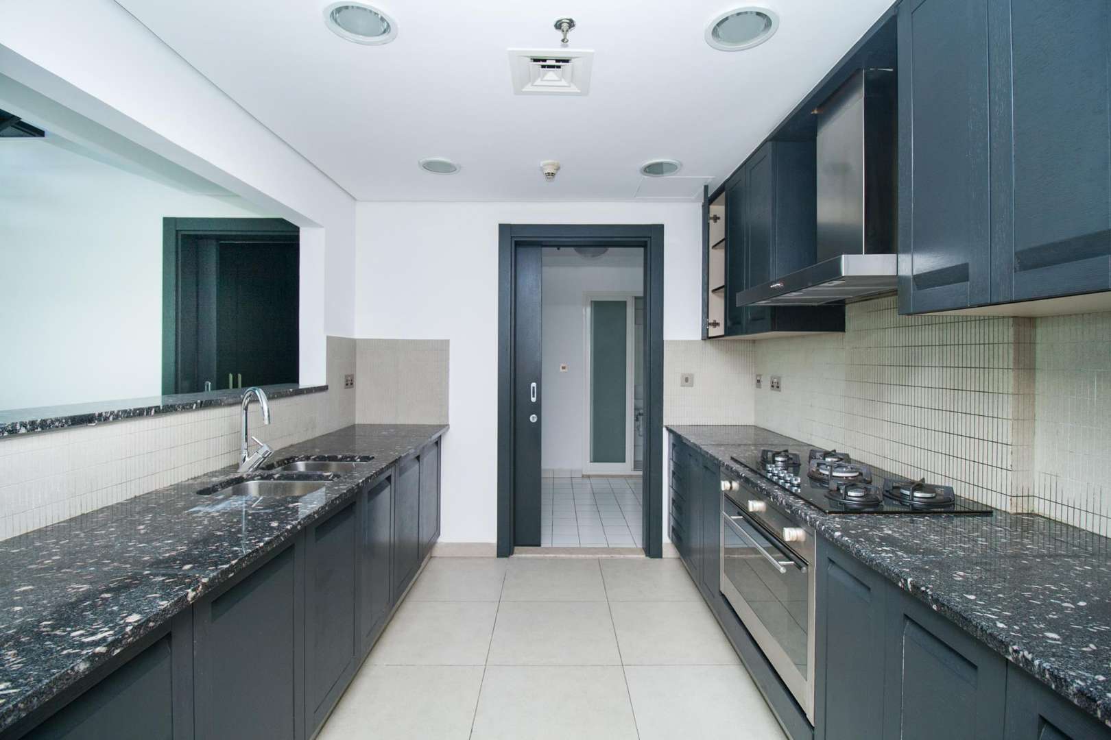 Modern duplex interior with staircase in Jumeirah Heights apartment for rent, Cluster A