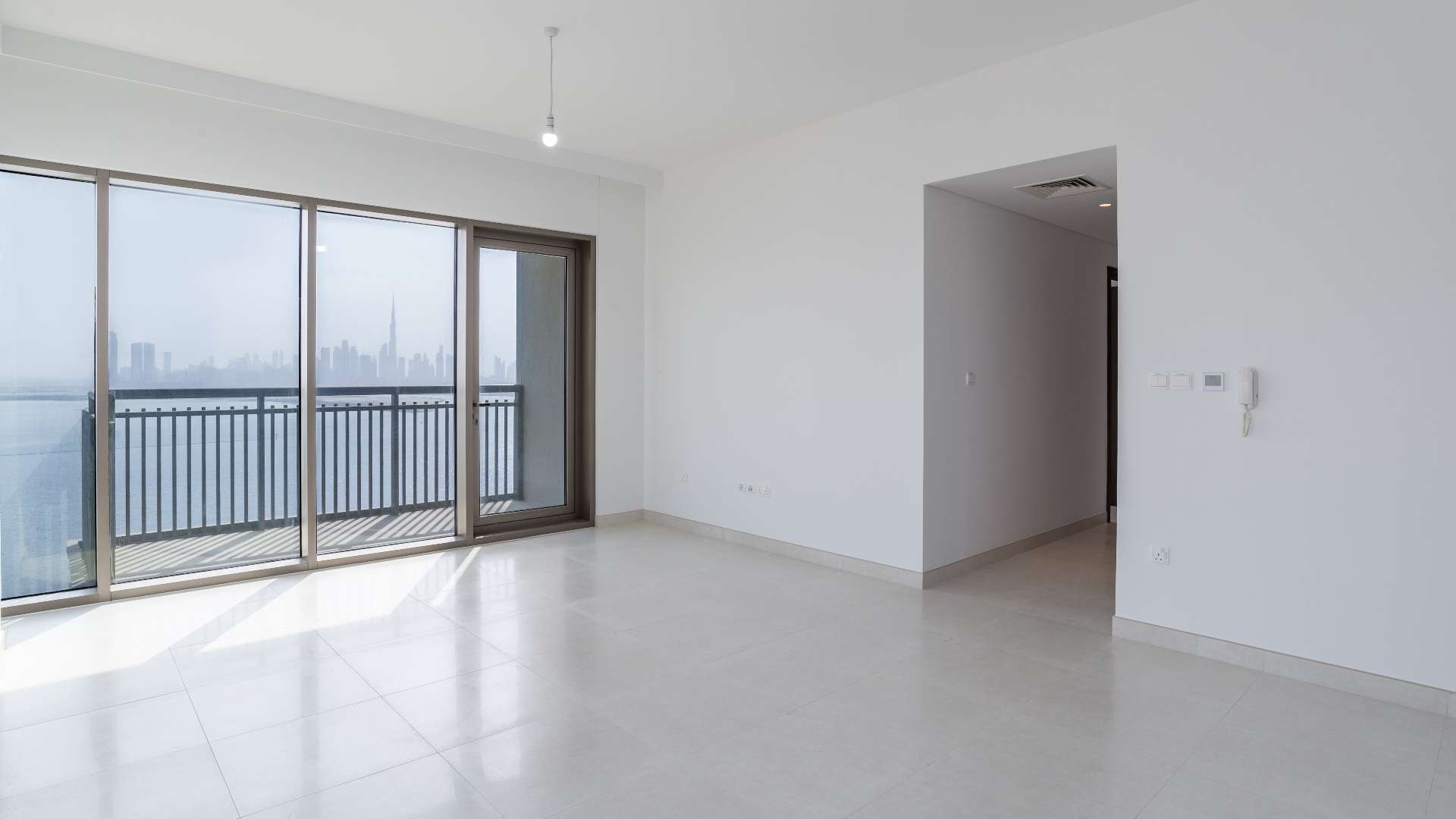 Modern kitchen with balcony view in Creekside 18, Dubai Creek Harbour apartment for rent