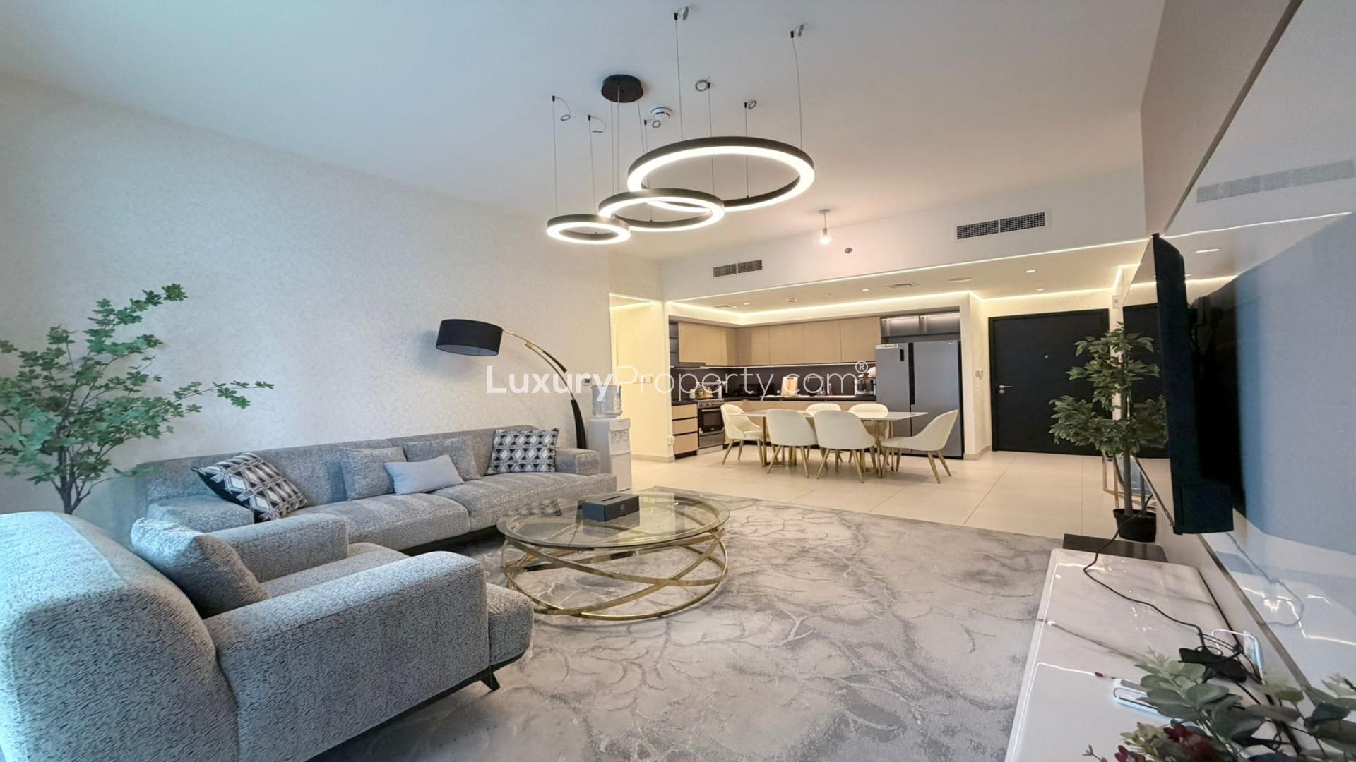High-floor Burj Crown apartment with Italian furniture, modern kitchen, and spacious living area
