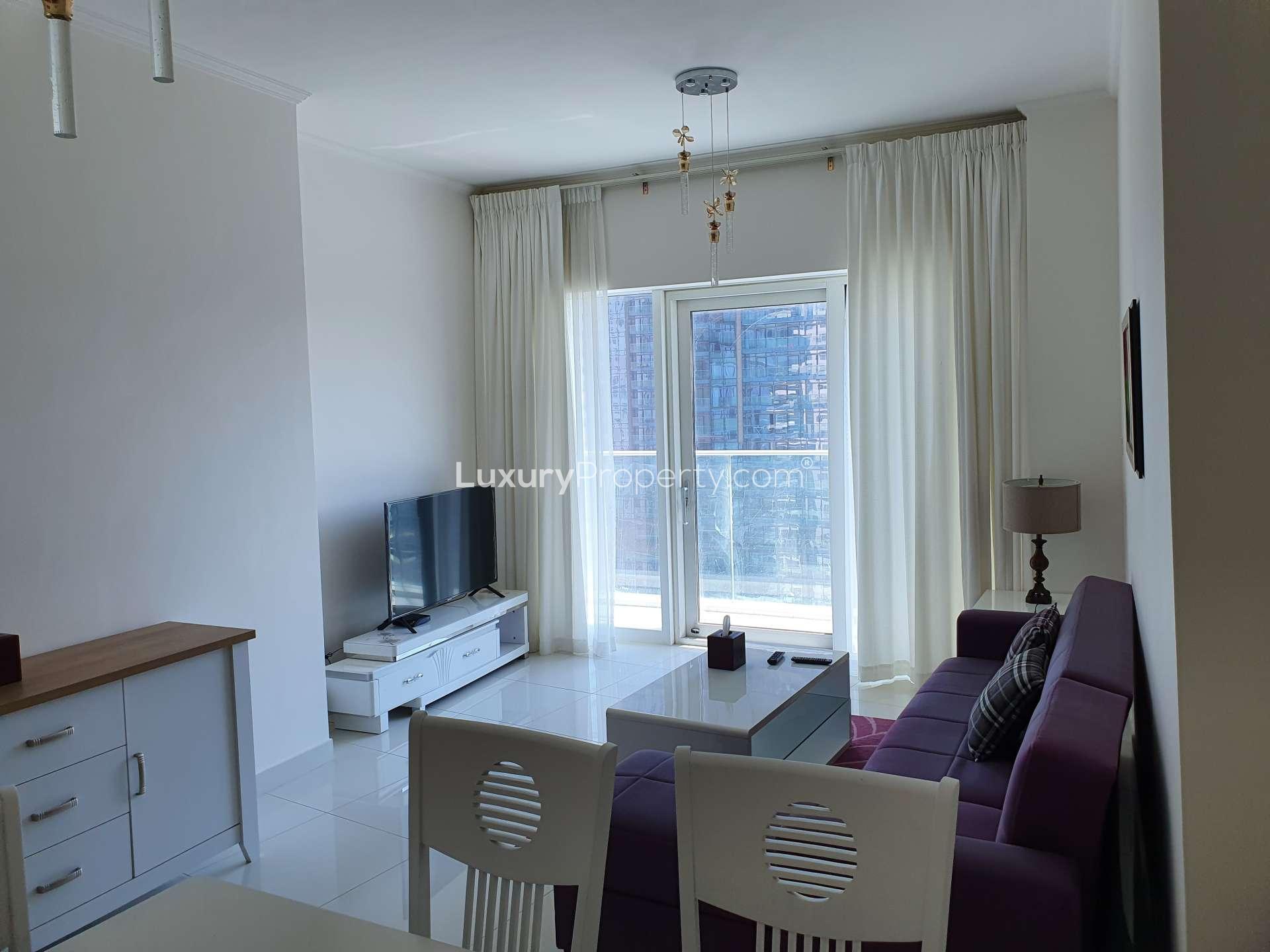 Modern living room and dining area in Damac Heights, Dubai Marina apartment