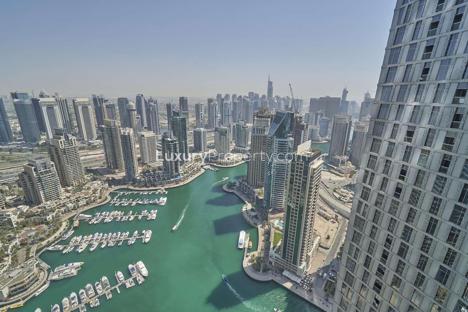 Luxurious living room with city view in Fendi Apartment, DAMAC Heights, Dubai Marina