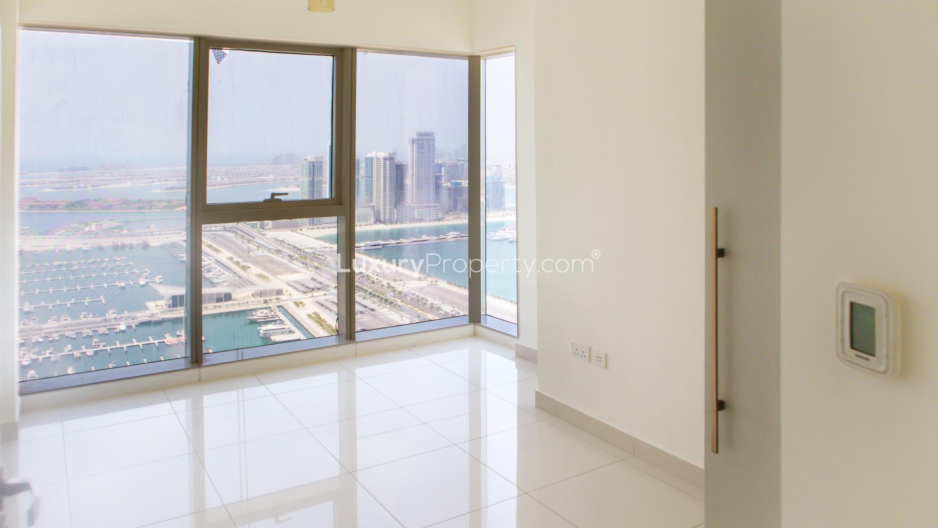 Modern sea view apartment interior with large windows in Damac Heights, Dubai Marina