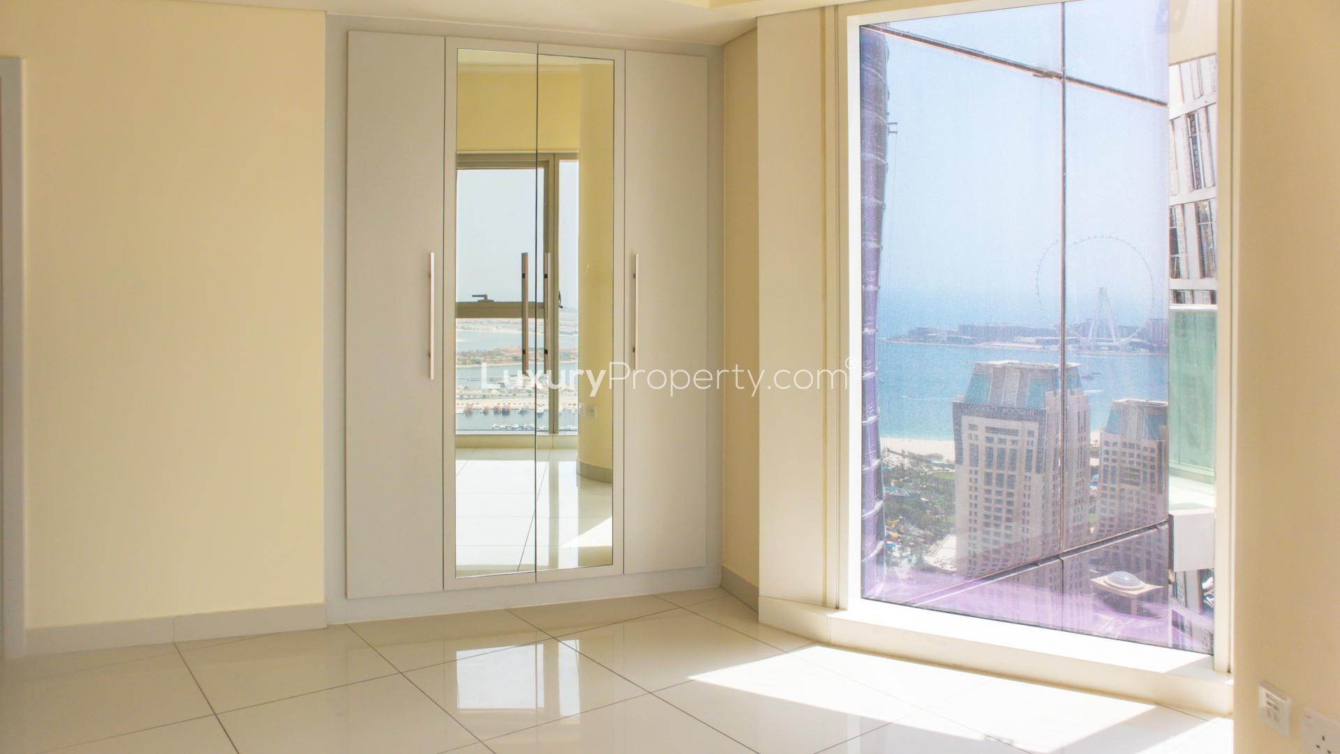 Sea view from modern apartment in Damac Heights, Dubai Marina, featuring large windows