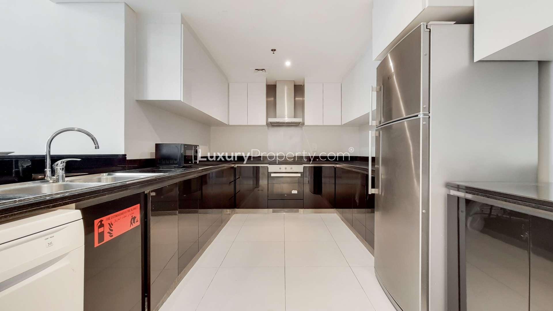 Modern furnished living and dining area in Damac Heights, Dubai Marina apartment for rent