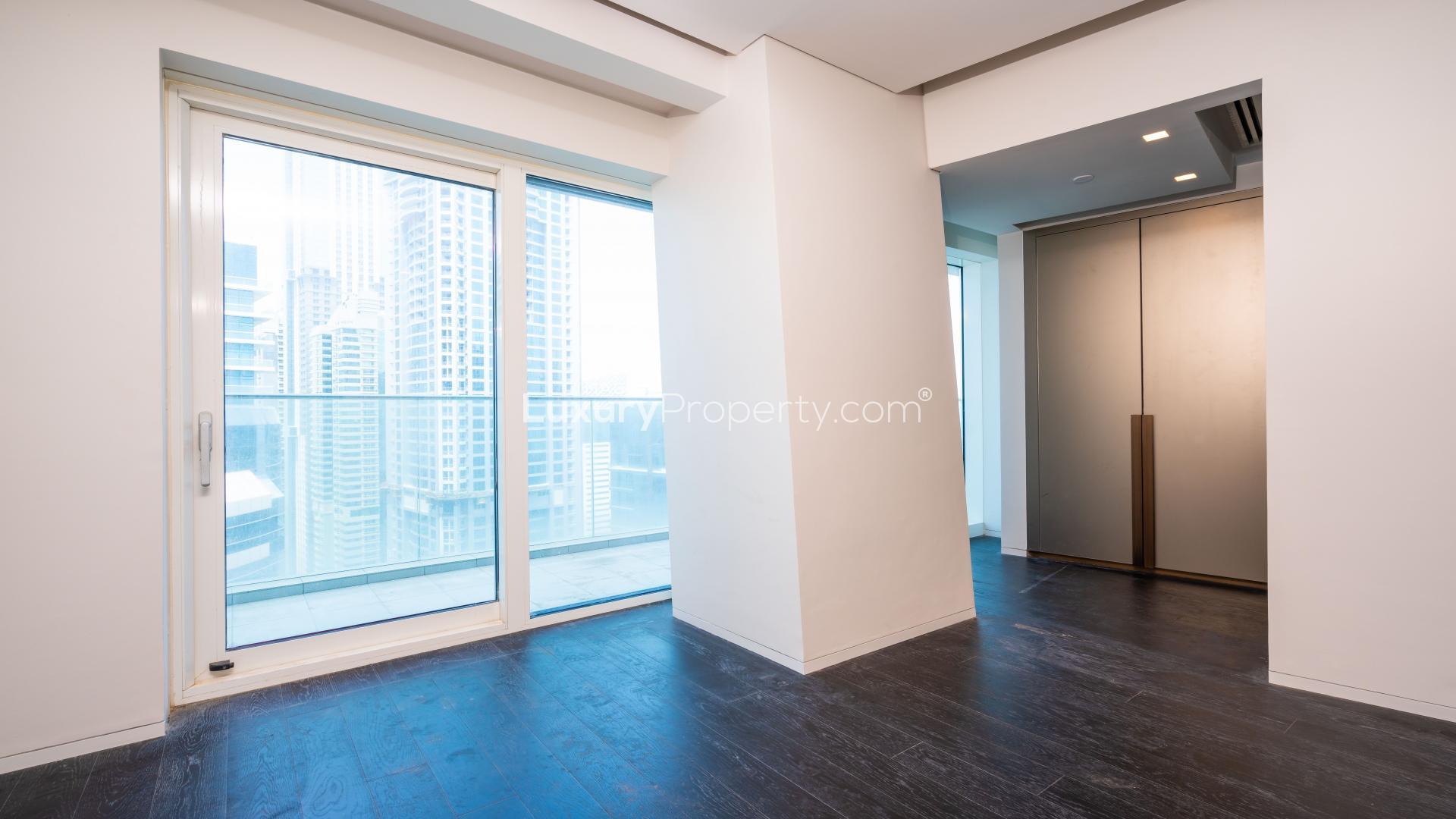 Balcony view from Fendi apartment in Damac Heights, Dubai Marina, overlooking the sea and skyline