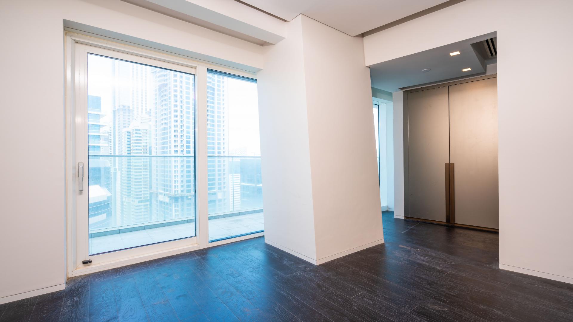 Balcony view from Fendi apartment in Damac Heights, Dubai Marina, overlooking the sea and skyline