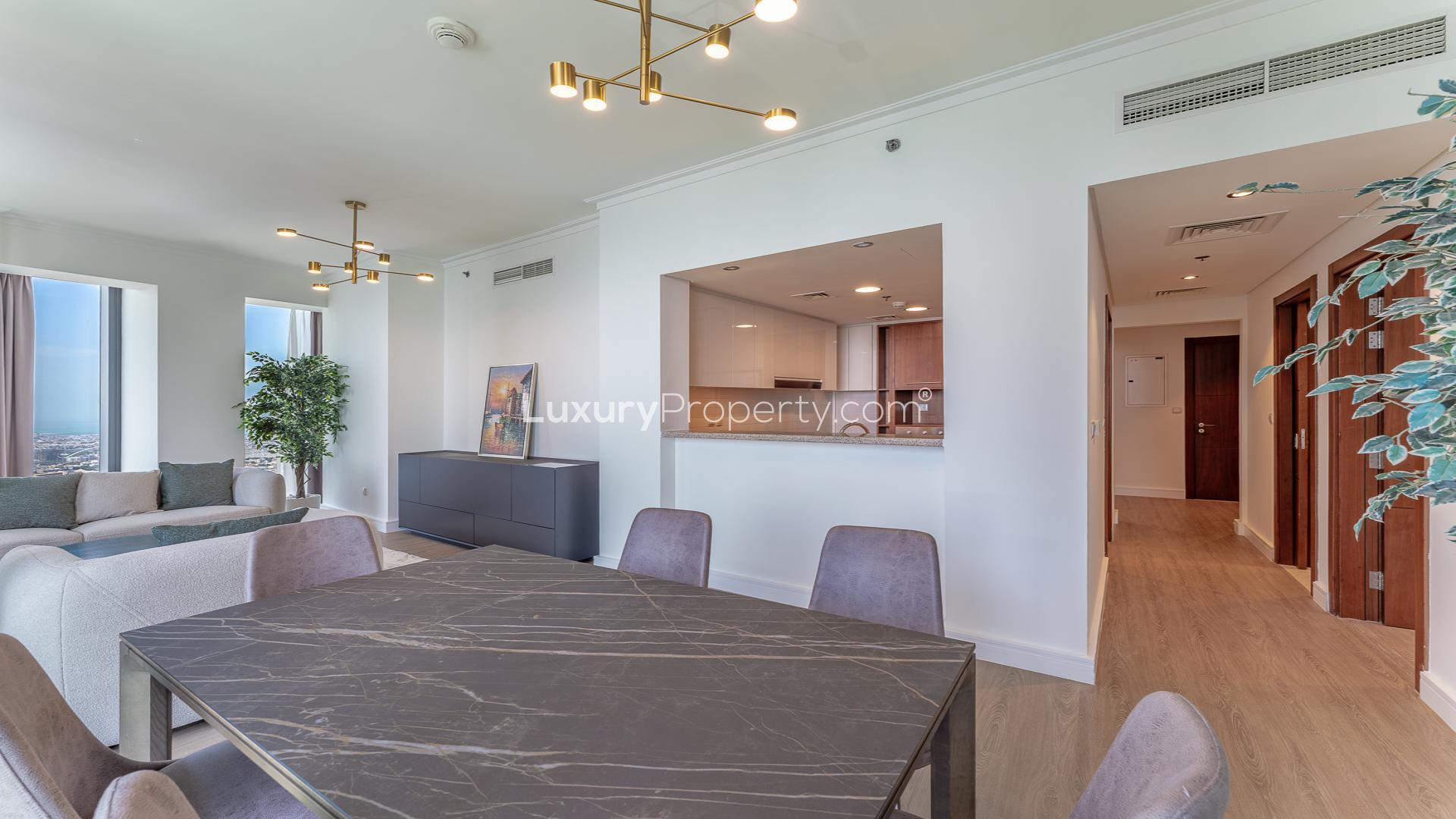 Furnished living room with panoramic Burj Khalifa views in Downtown Dubai apartment for rent