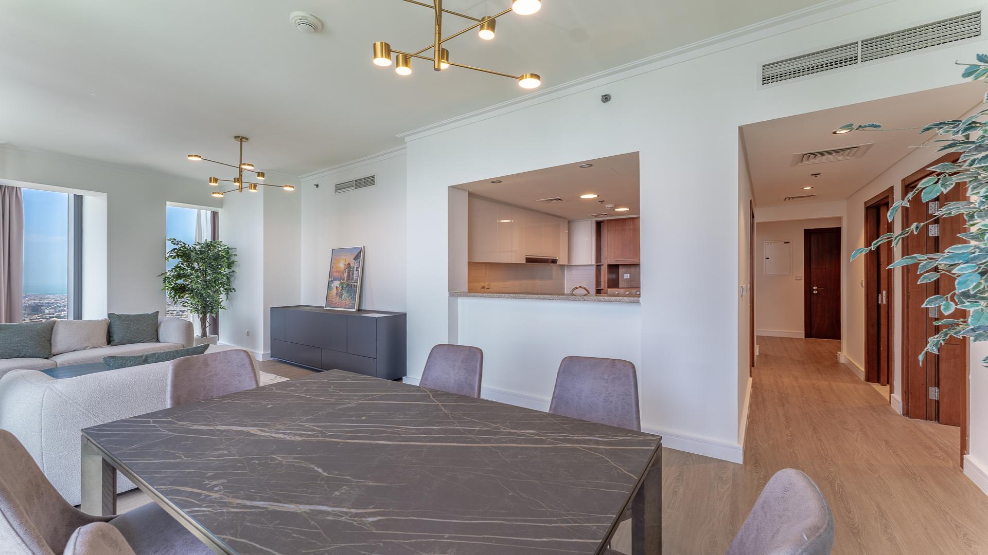 Furnished living room with panoramic Burj Khalifa views in Downtown Dubai apartment for rent