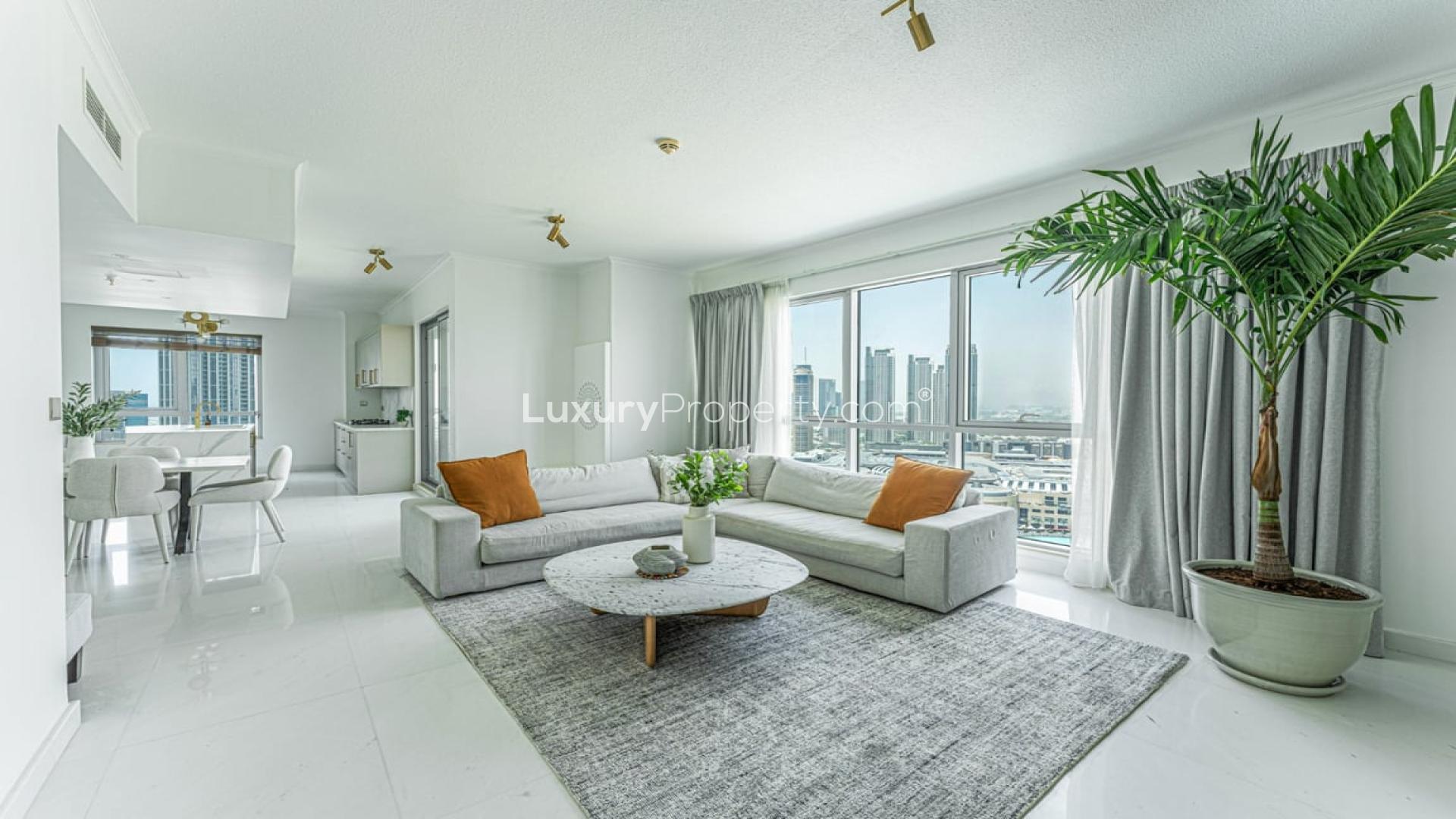 Dining area in spacious Downtown Dubai apartment with city views, modern design, and natural light