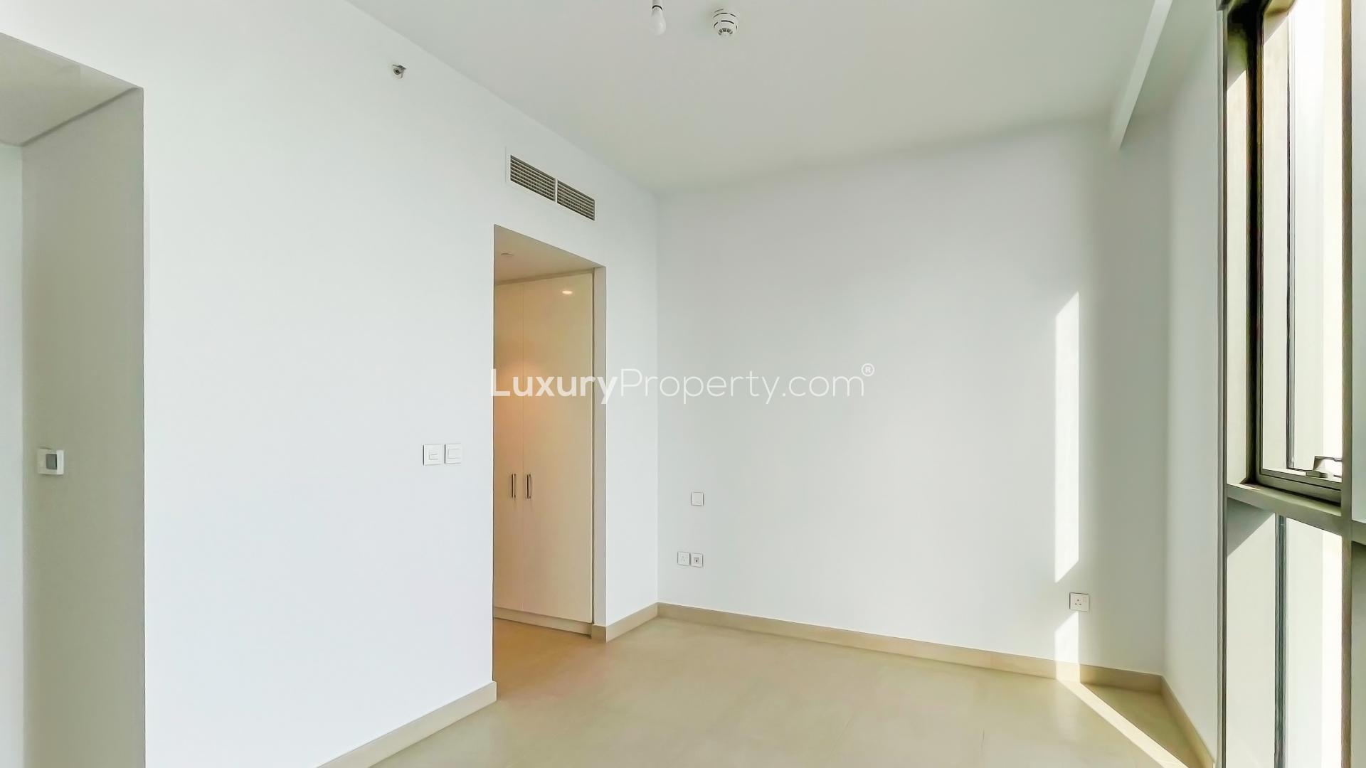 High-floor apartment view, Downtown Dubai skyline, featuring Burj Khalifa, available for rent