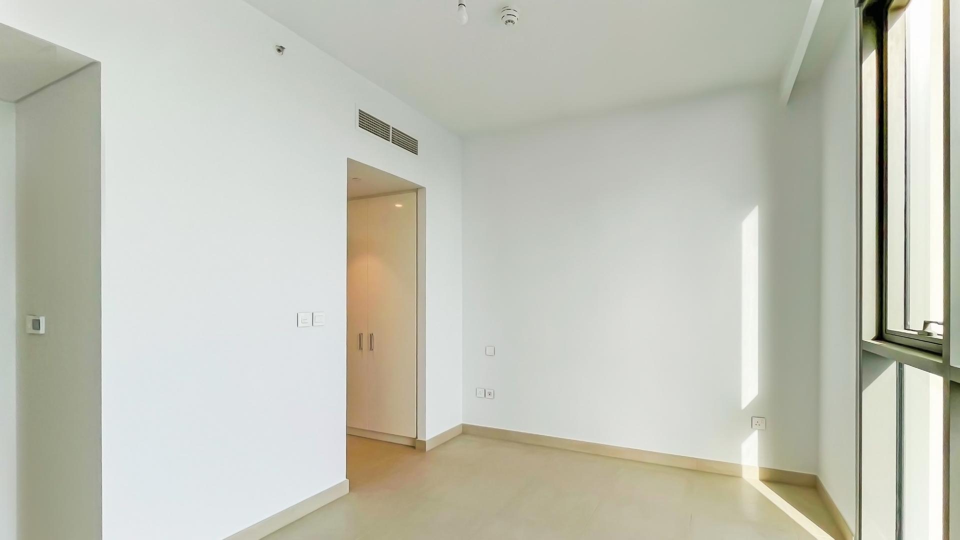 High-floor apartment view, Downtown Dubai skyline, featuring Burj Khalifa, available for rent