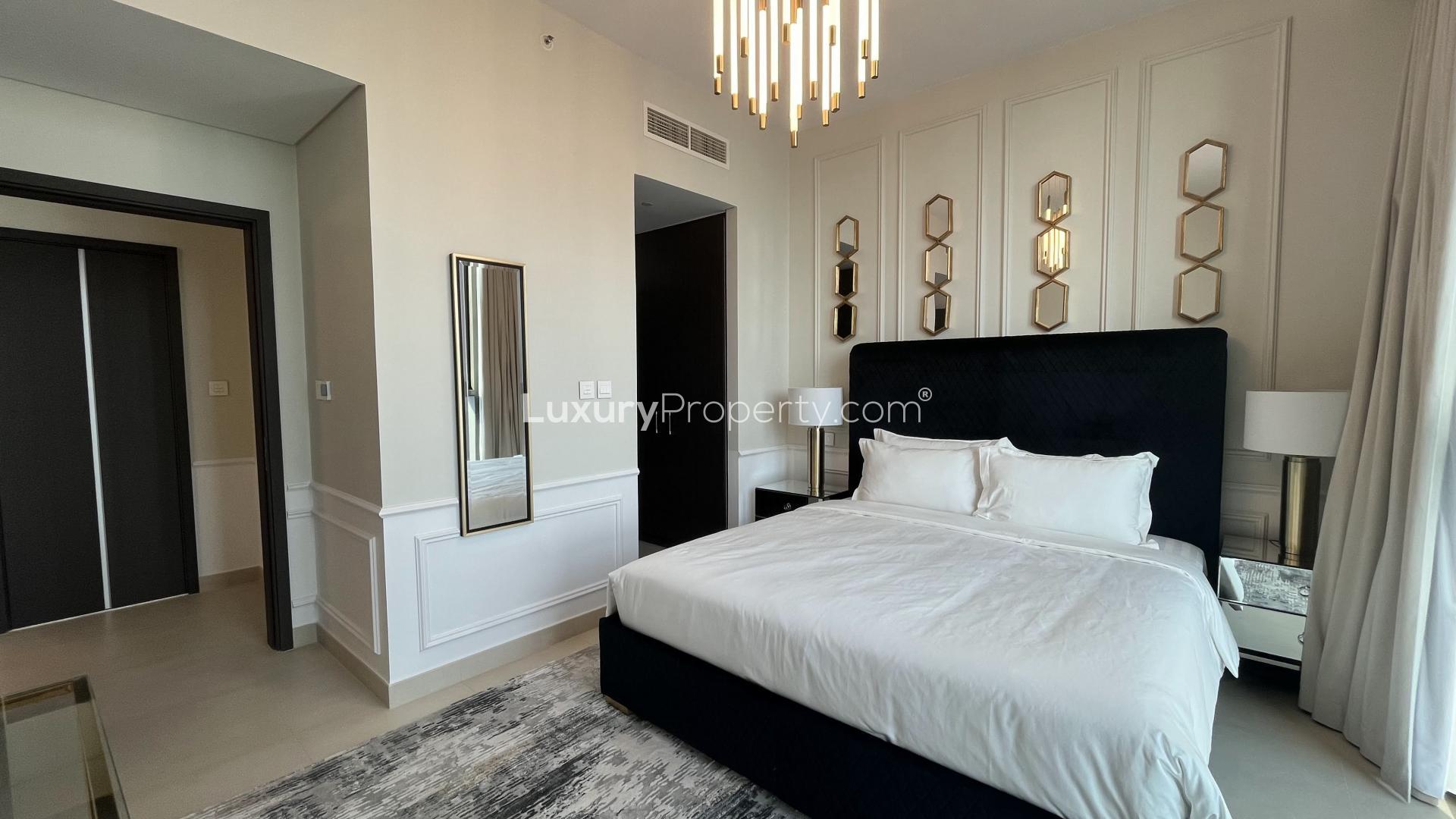 High-rise apartment interior with modern furnishings and skyline view in Downtown Dubai