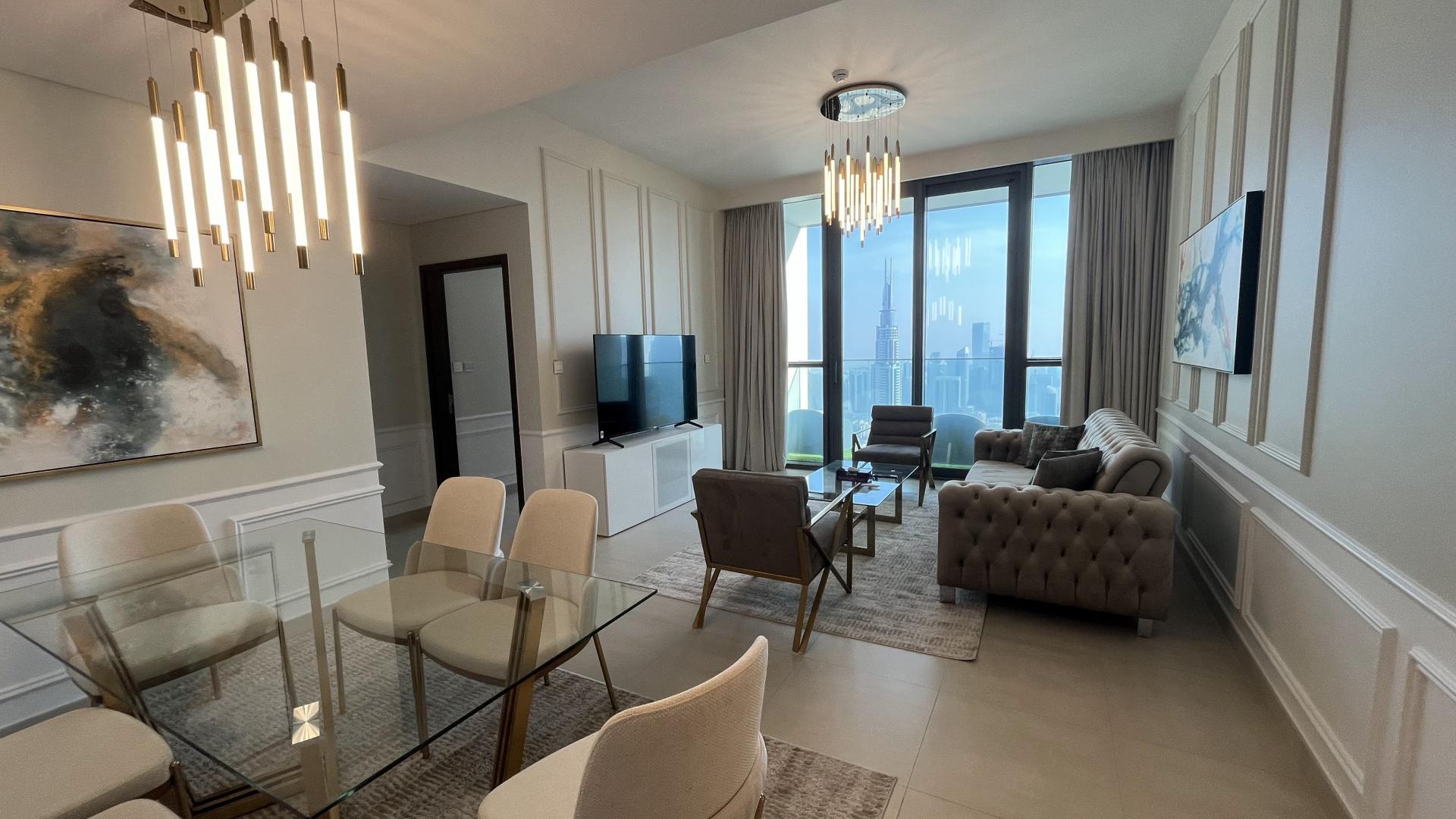 Luxurious living room in Downtown Dubai apartment with modern decor and elegant furnishings