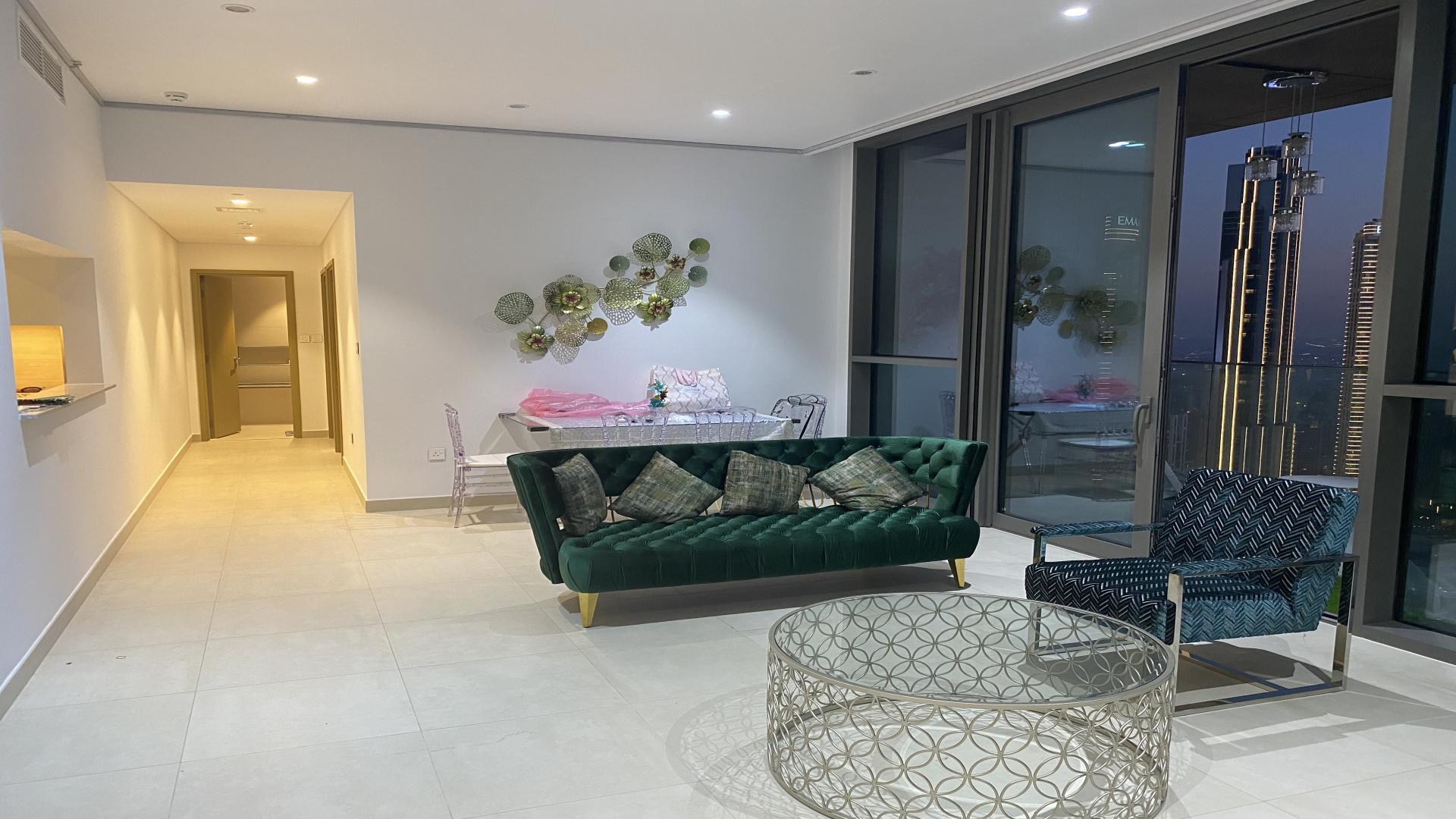 Luxurious Downtown Dubai apartment interior with Burj Khalifa view, elegant furnishings, spacious layout