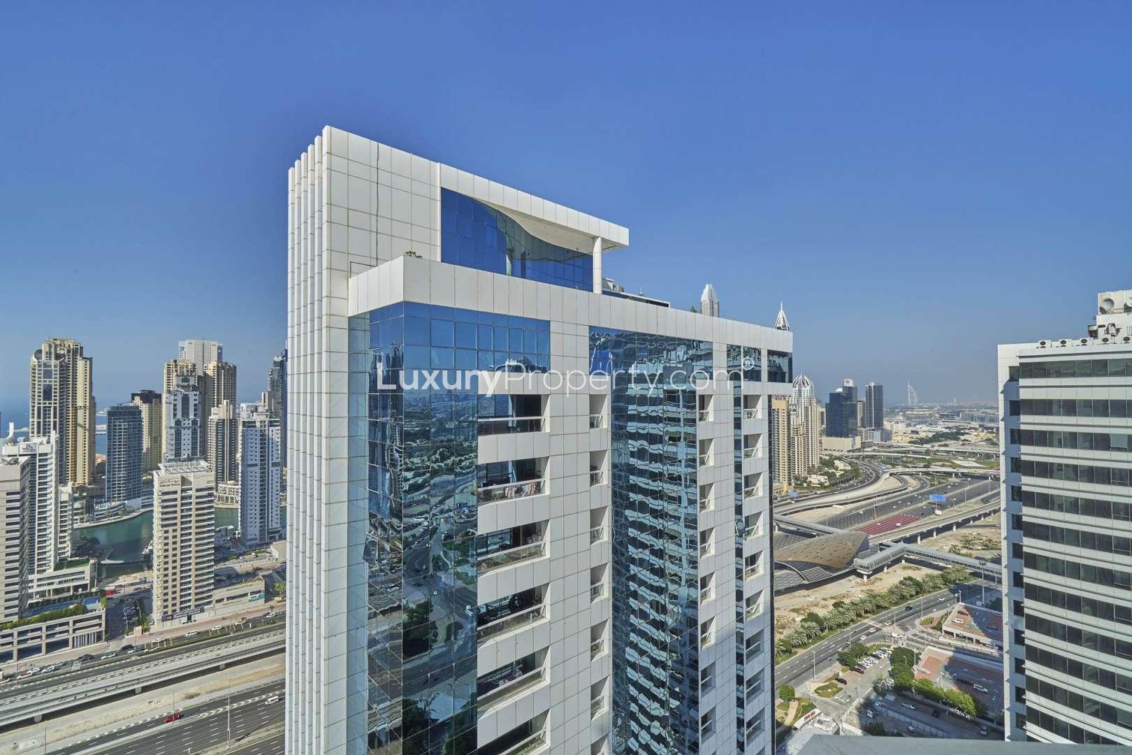 Spacious living area in 3-bedroom apartment, Dubai Gate One, JLT, with natural light