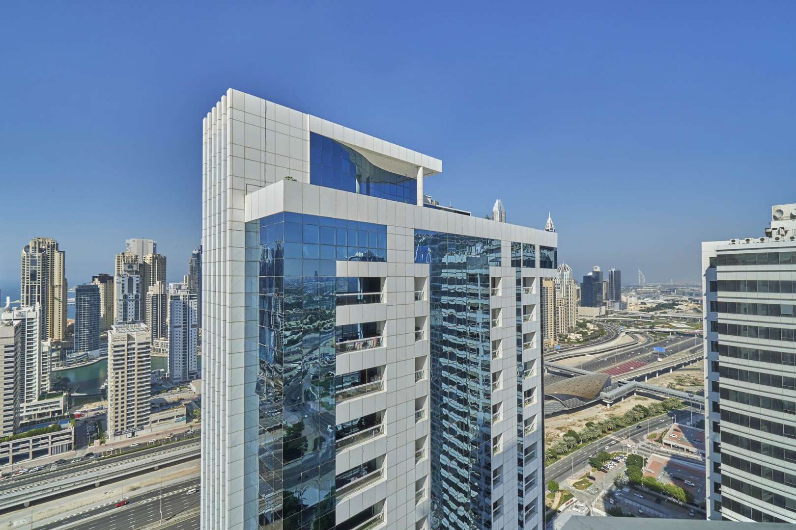 Spacious living area in 3-bedroom apartment, Dubai Gate One, JLT, with natural light
