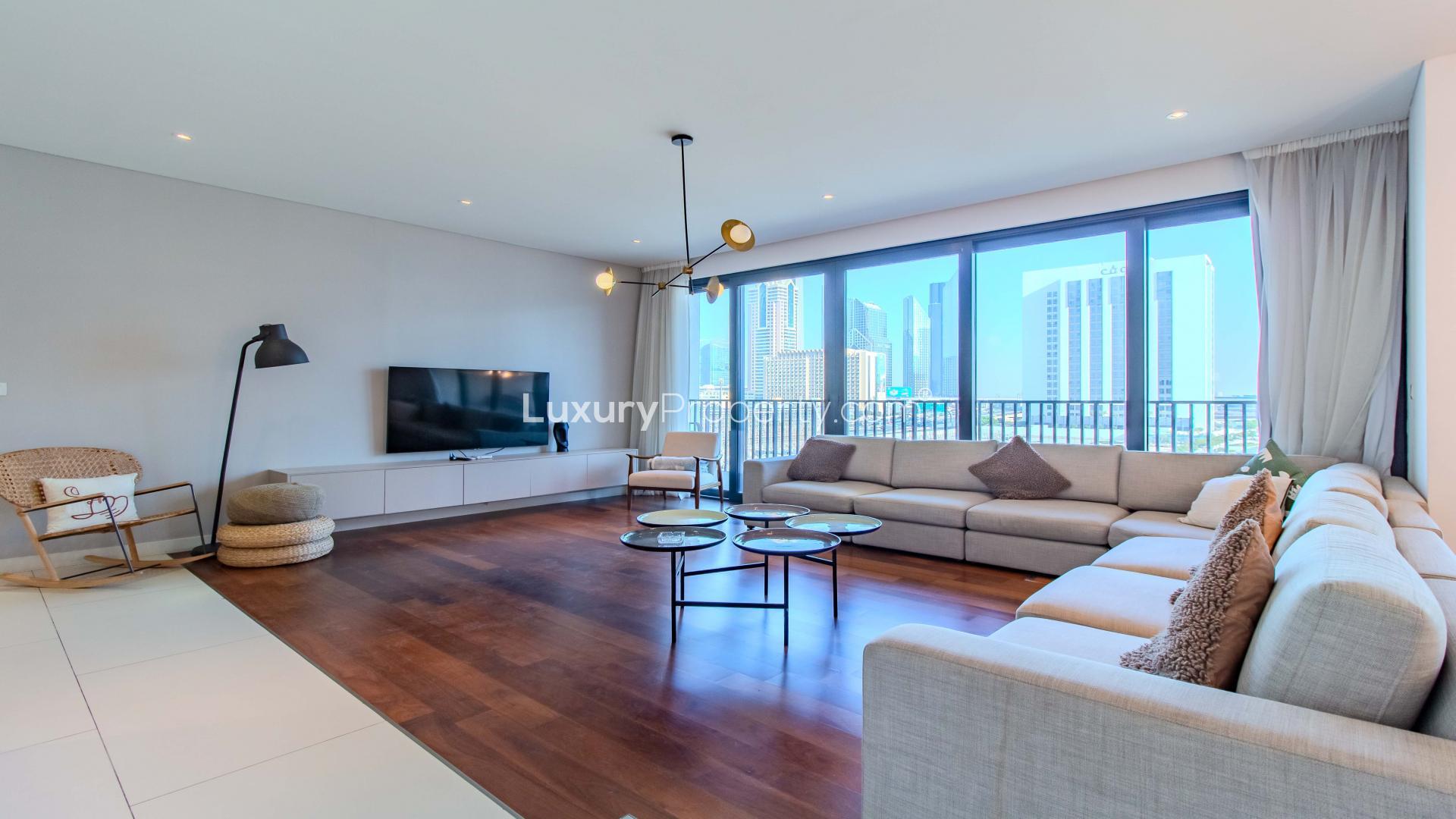 Spacious City Walk apartment living room with Burj Khalifa view, modern furnishings