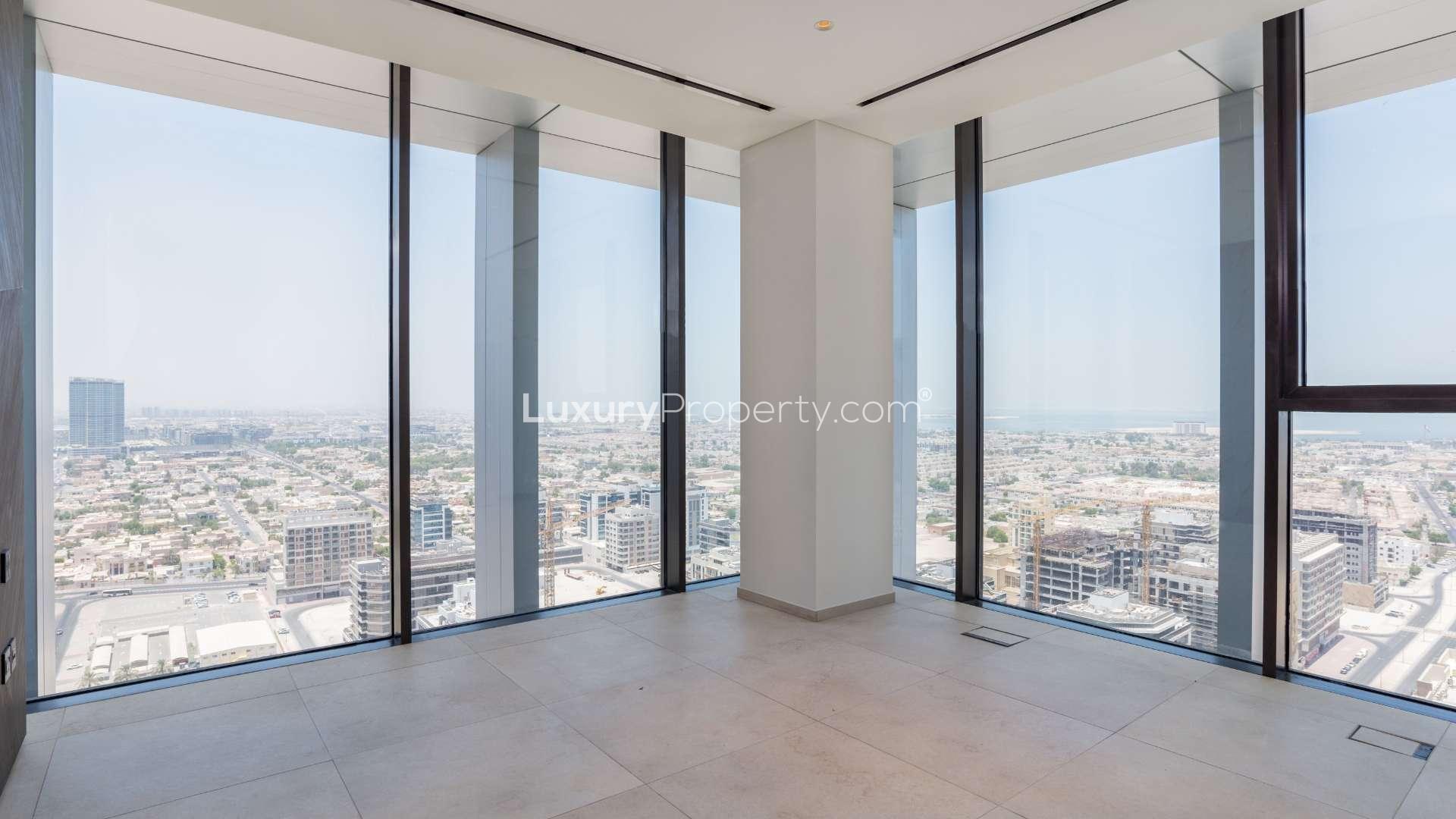 Luxurious spacious living room with panoramic city views in Eden House apartment, Al Satwa
