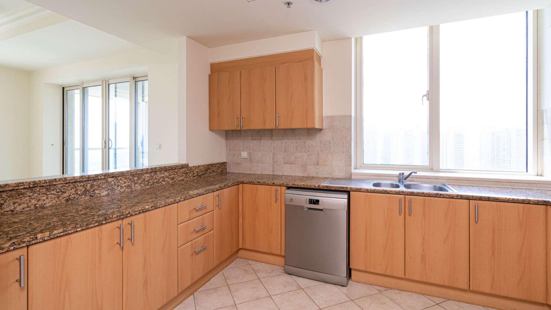 Spacious kitchen and living area in Dubai Marina apartment, Emaar 6 Towers